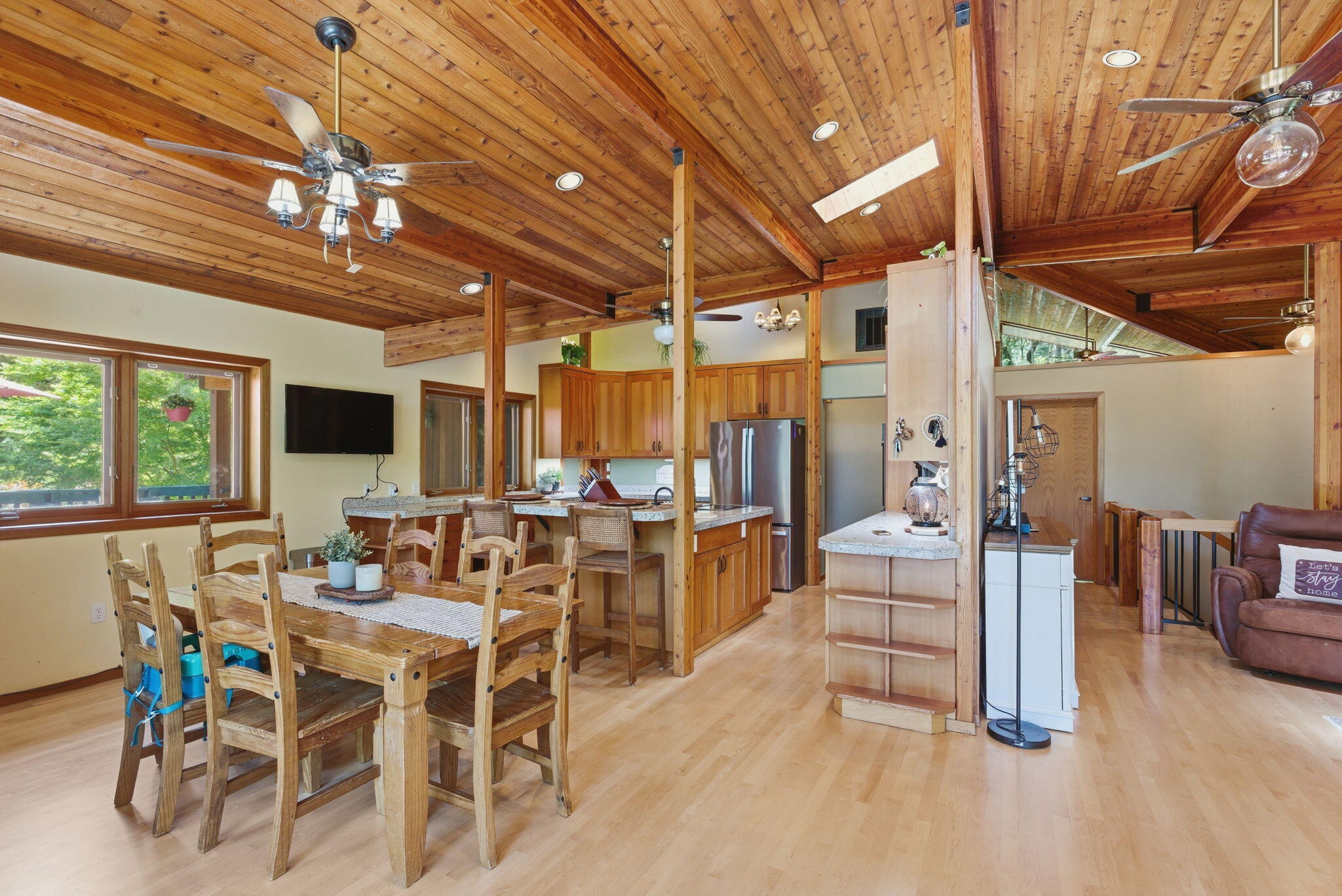856 Greentree Loop Grants Pass, OR 97527 - Photo 15 of 62 a view of a dining room with furniture window and outside view