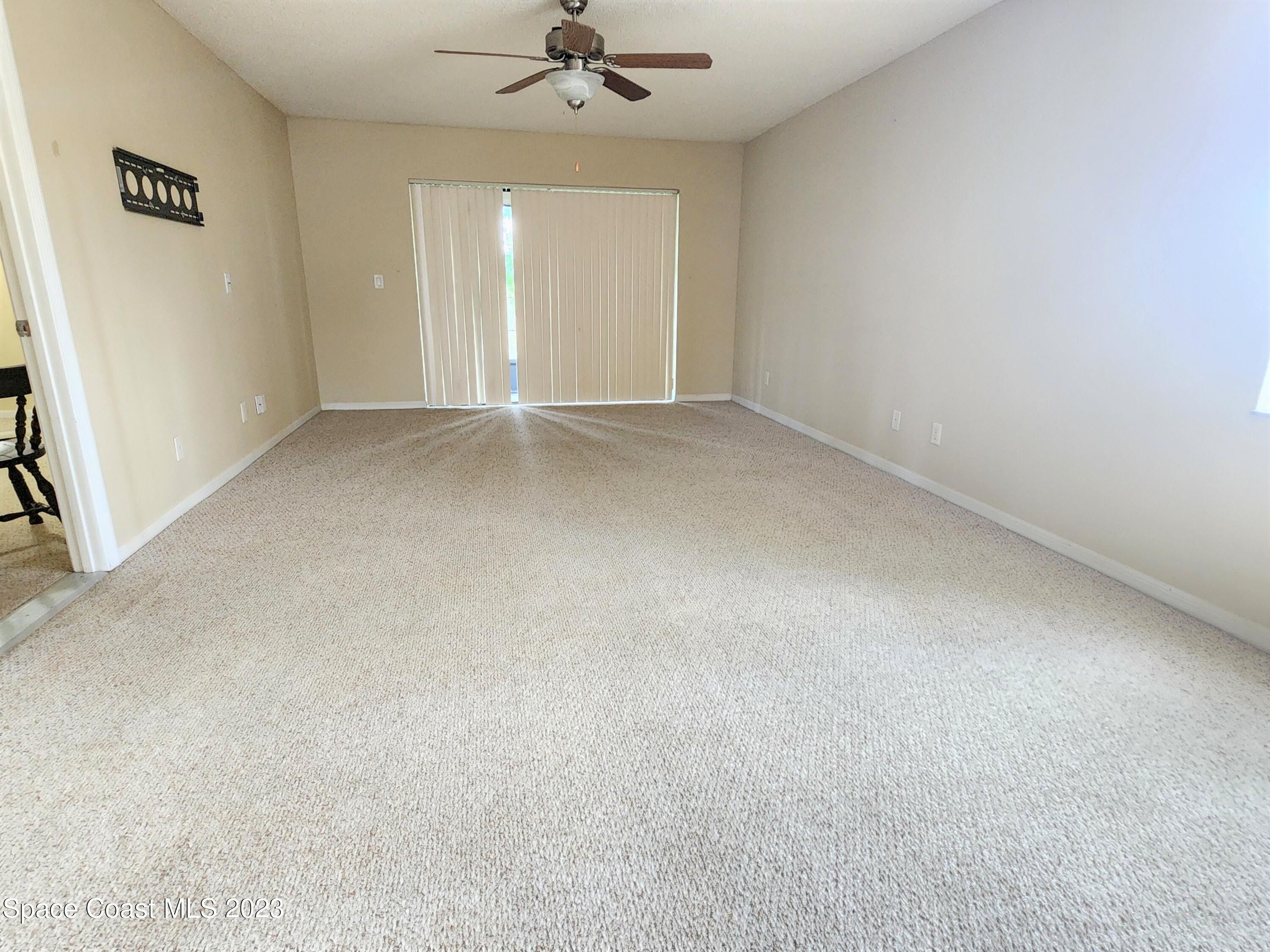 2939 Regency Drive Melbourne, FL 32935 - Photo 13 of 39 an empty room with a window