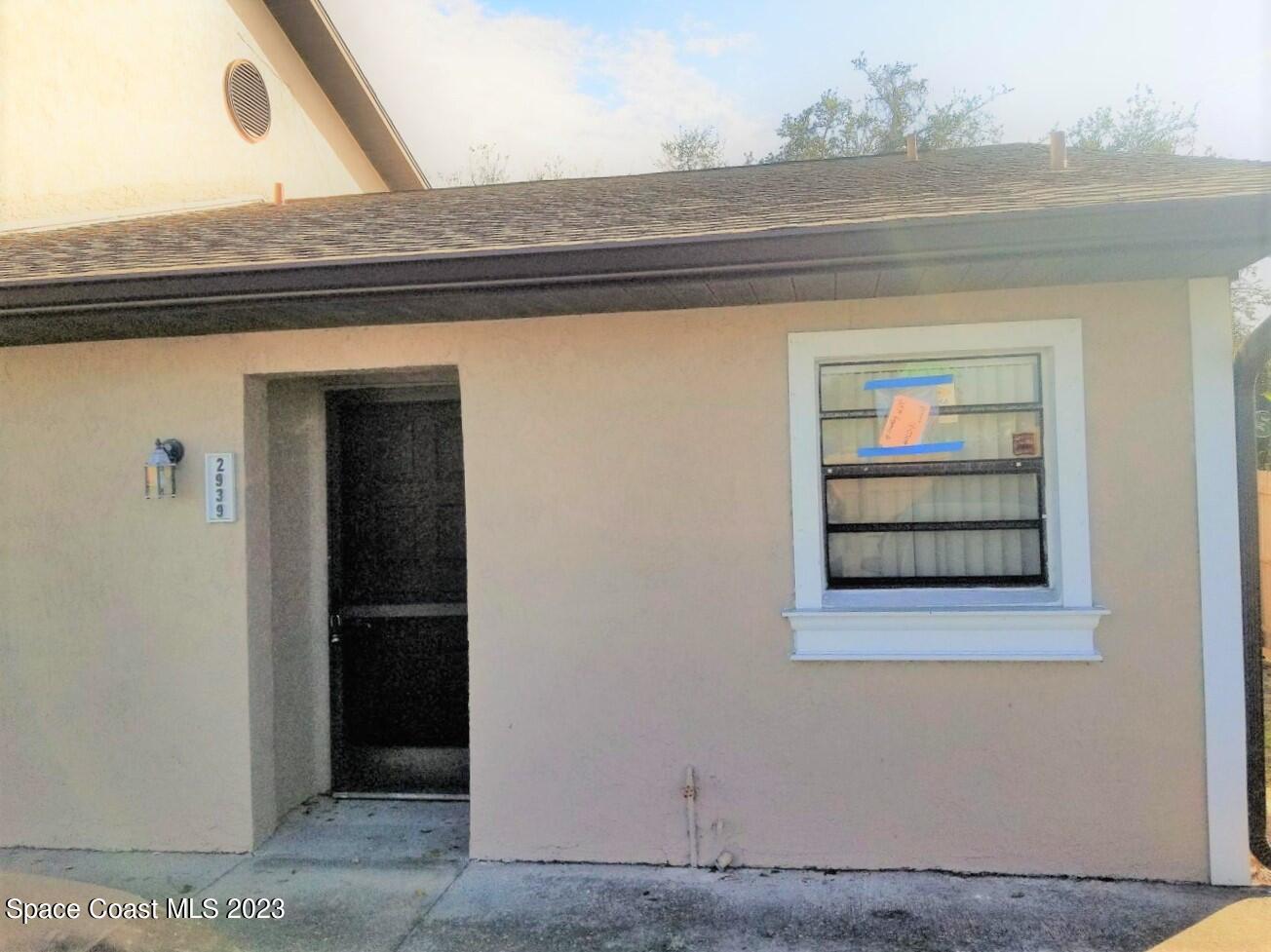 2939 Regency Drive Melbourne, FL 32935 - Photo 2 of 39 a view of a hallway