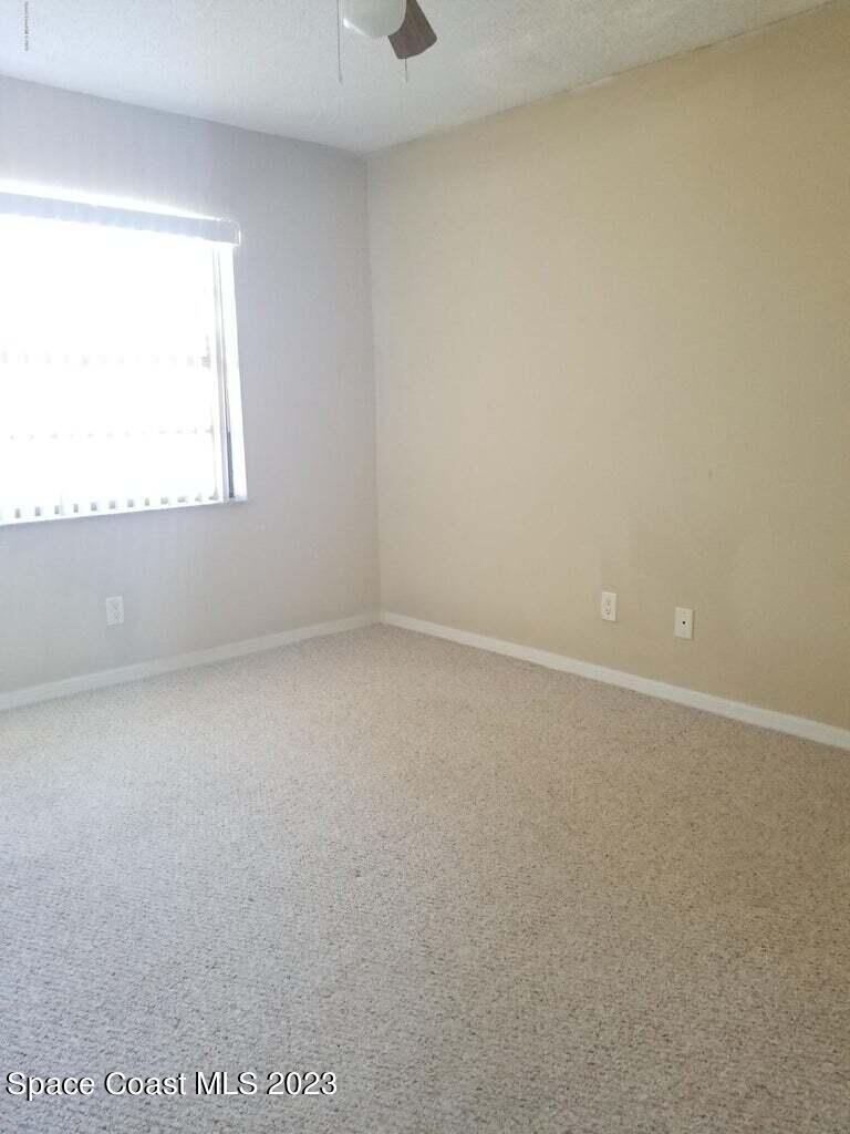 2939 Regency Drive Melbourne, FL 32935 - Photo 25 of 39 an empty room with a window