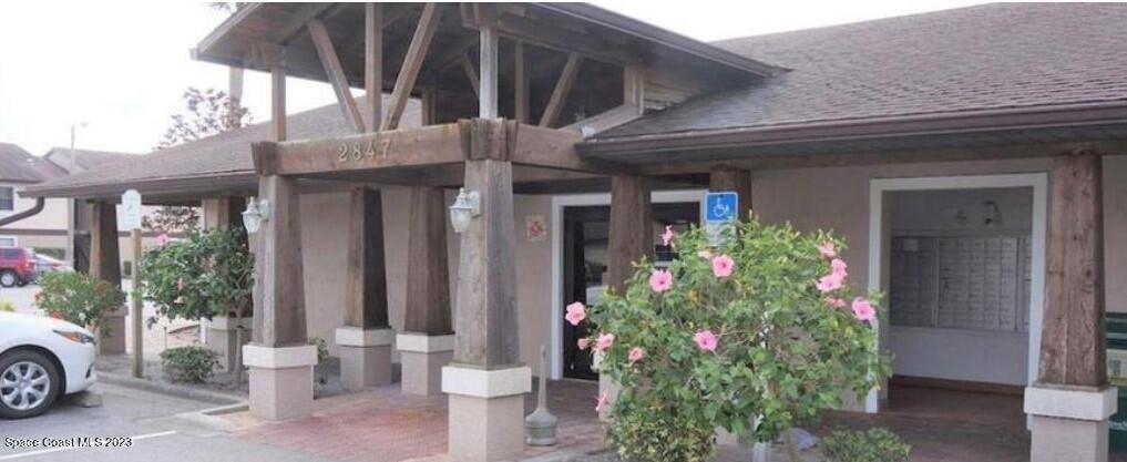 2939 Regency Drive Melbourne, FL 32935 - Photo 30 of 39 a view of a house with potted plants