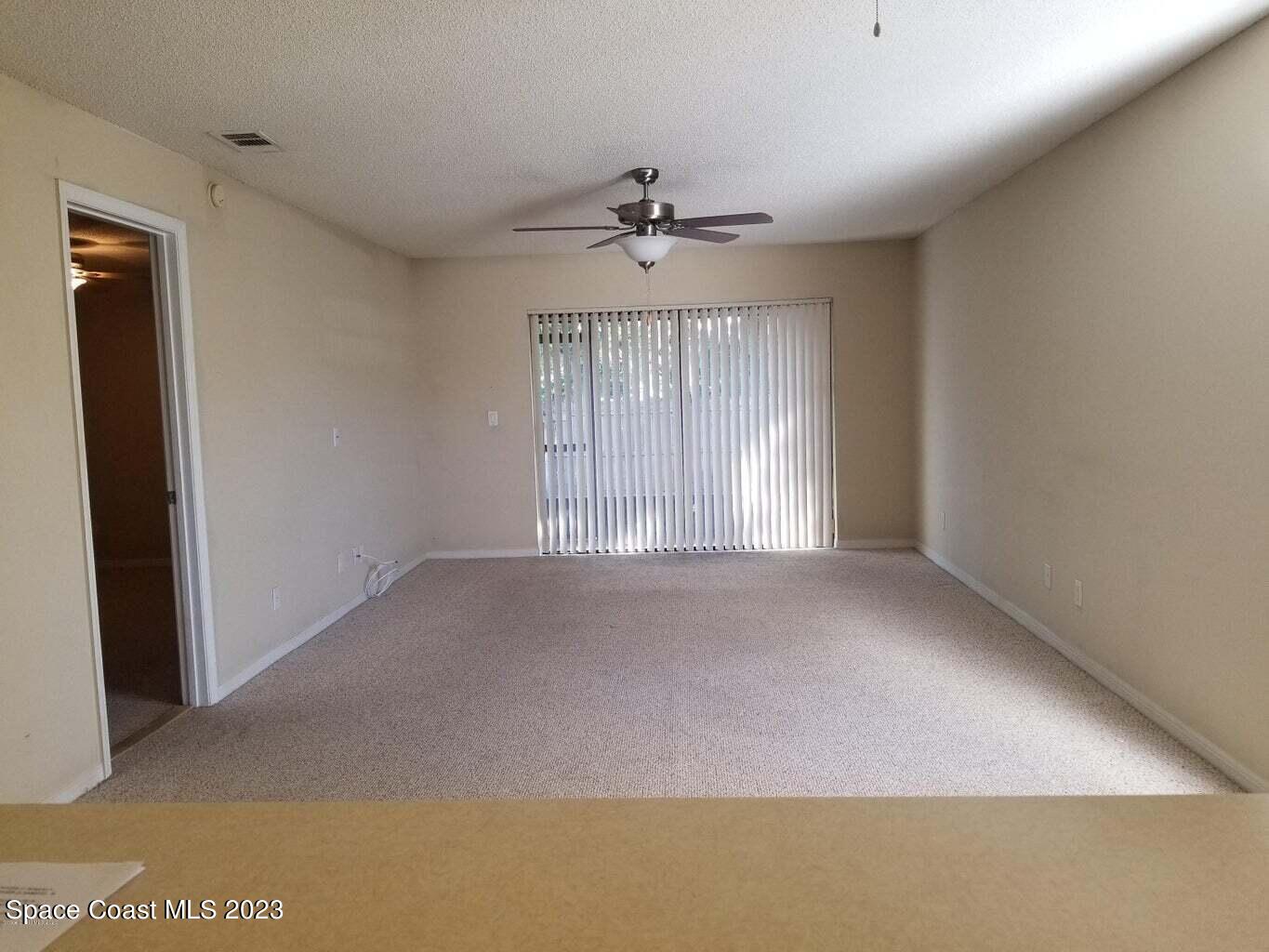 2939 Regency Drive Melbourne, FL 32935 - Photo 34 of 39 a view of an empty room with a window