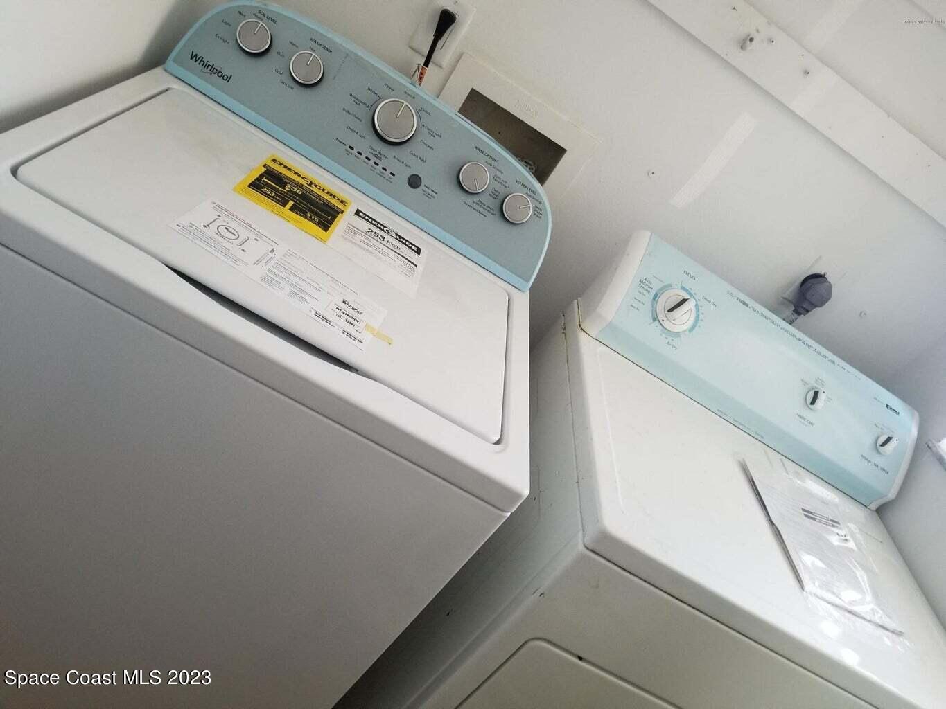 2939 Regency Drive Melbourne, FL 32935 - Photo 38 of 39 a utility room with dryer and washer