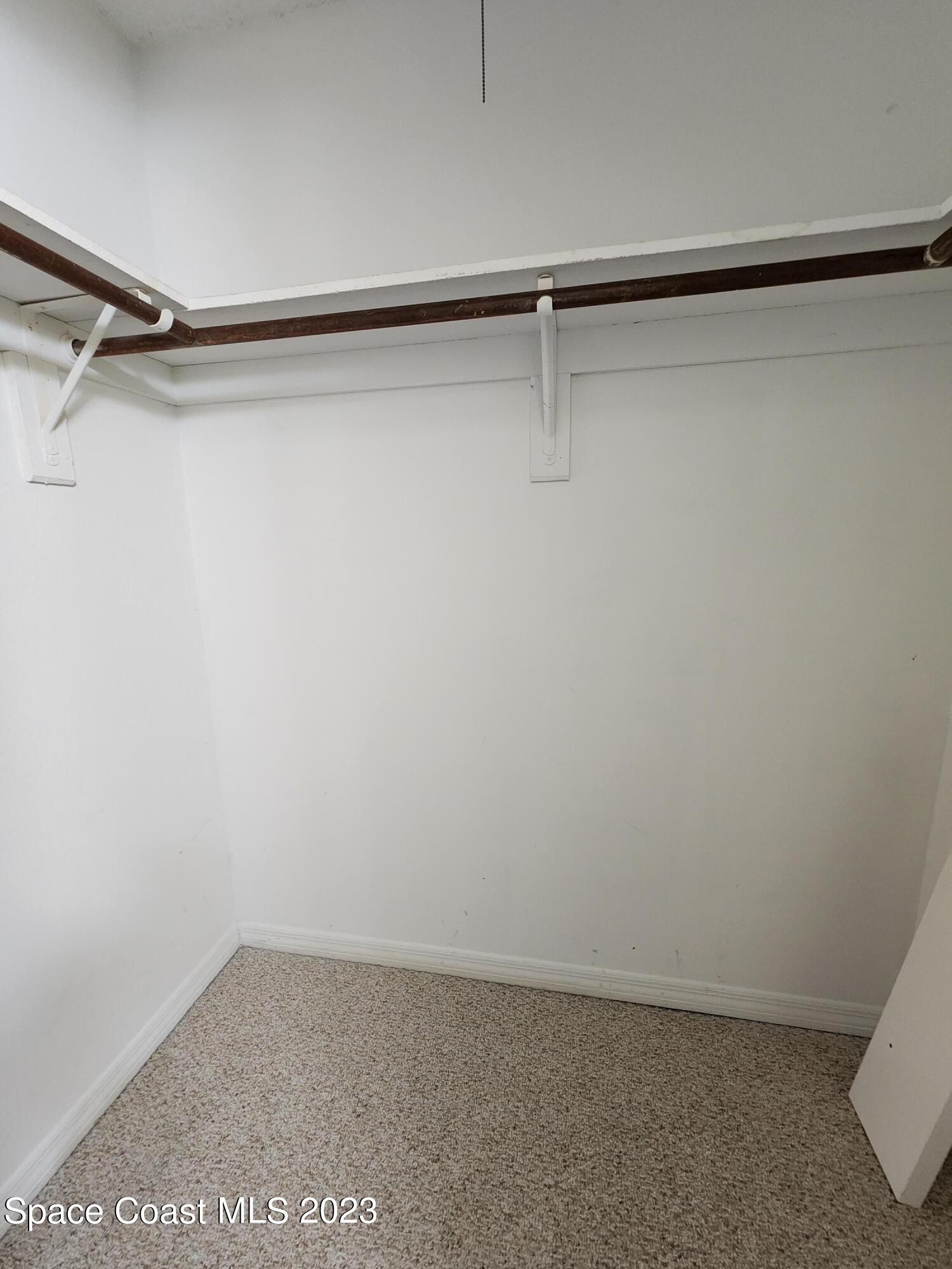 2939 Regency Drive Melbourne, FL 32935 - Photo 8 of 39 a view of small space with racks on the wall