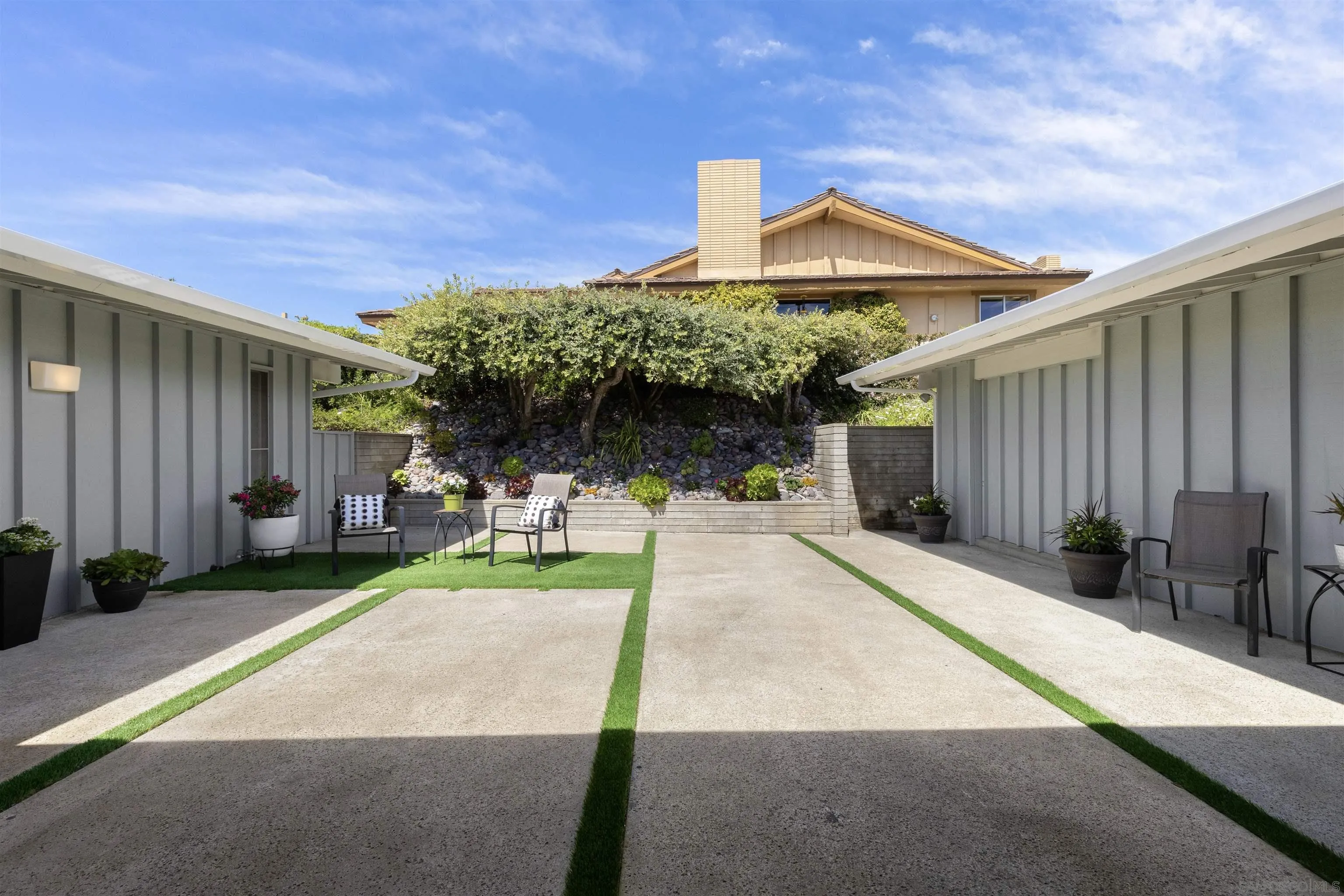5502 Rutgers Road La Jolla, CA 92037 - Photo 24 of 28 a front view of a house with garden