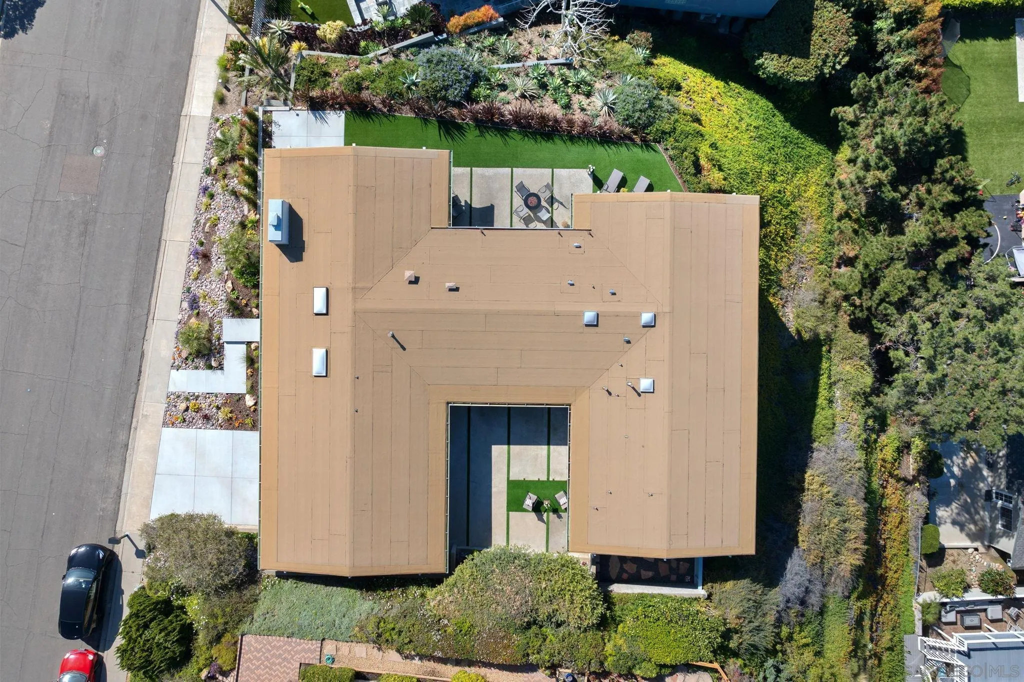 5502 Rutgers Road La Jolla, CA 92037 - Photo 25 of 28 an aerial view of a house with a yard and large tree