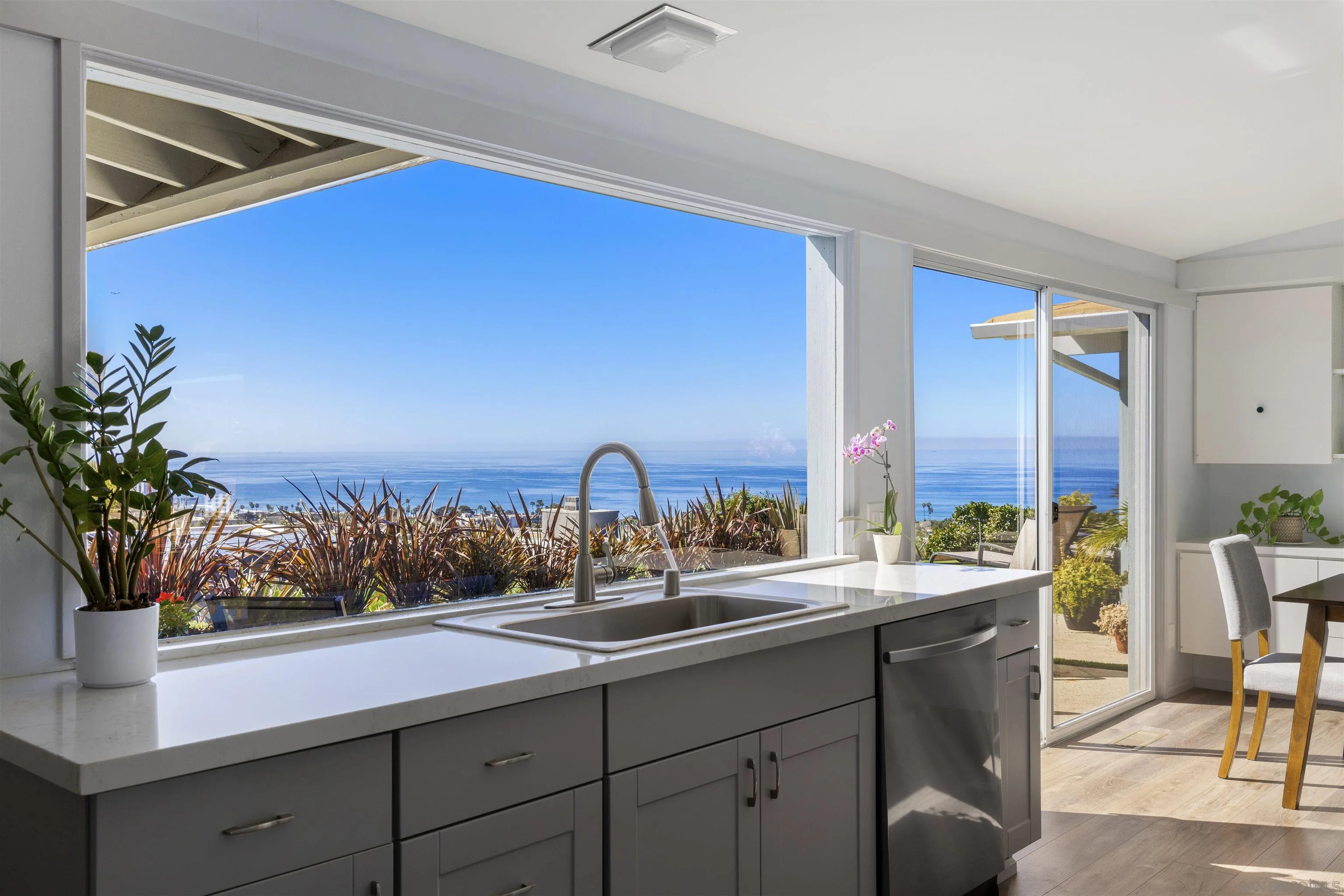 5502 Rutgers Road La Jolla, CA 92037 - Photo 8 of 28 a bathroom with a sink and a mirror