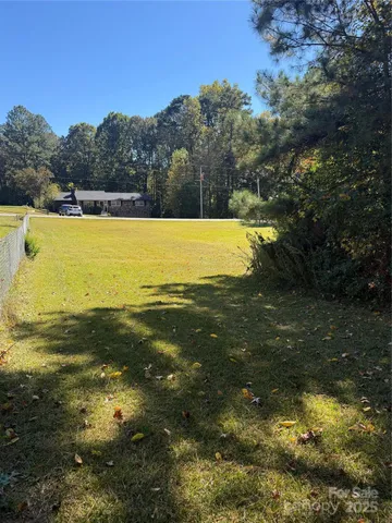 a view of an ocean and a yard
