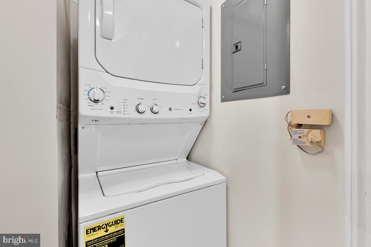 403 South Sharp Street, Unit R 2 Baltimore, MD 21201 - Photo 12 of 15 a utility room with dryer and washer