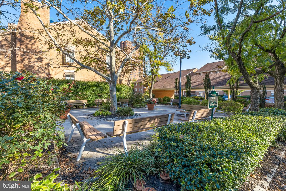 403 South Sharp Street, Unit R 2 Baltimore, MD 21201 - Photo 14 of 15 a view of a chair and table in backyard of the house