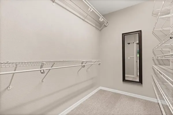 a view of a room with racks on the wall