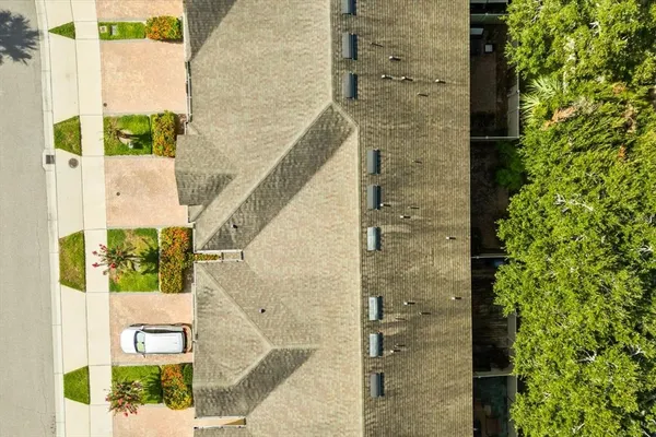 a view of a balcony with wooden floor