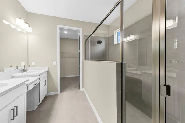 a bathroom with a sink a toilet and bathtub