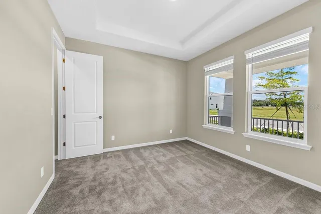 an empty room with a bathroom