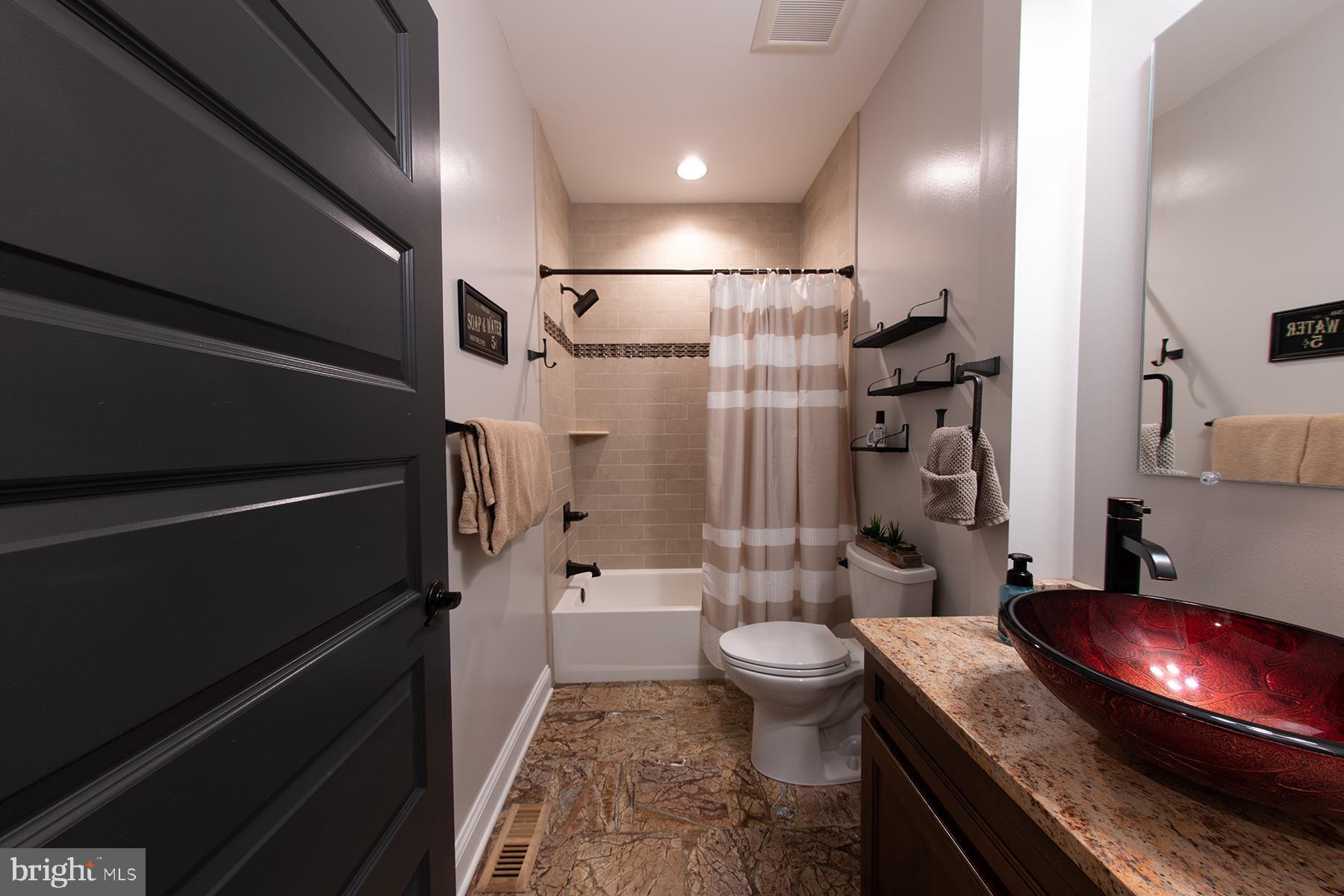 219 Old Magothy Bridge Road Pasadena, MD 21122 - Photo 42 of 85 1st floor full hall bath