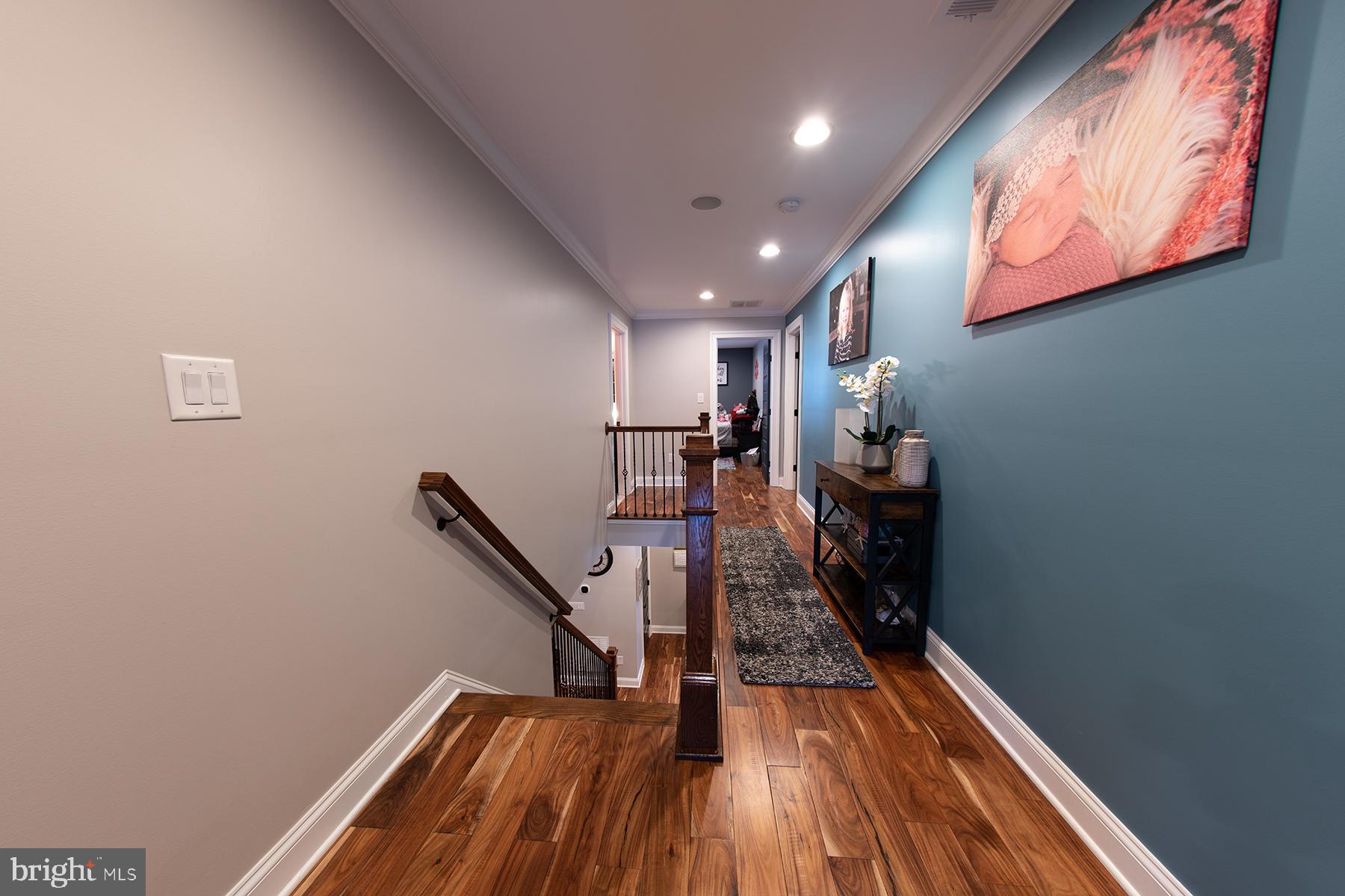 219 Old Magothy Bridge Road Pasadena, MD 21122 - Photo 57 of 85 Hallway from master looking at bedroom 2 and 3
