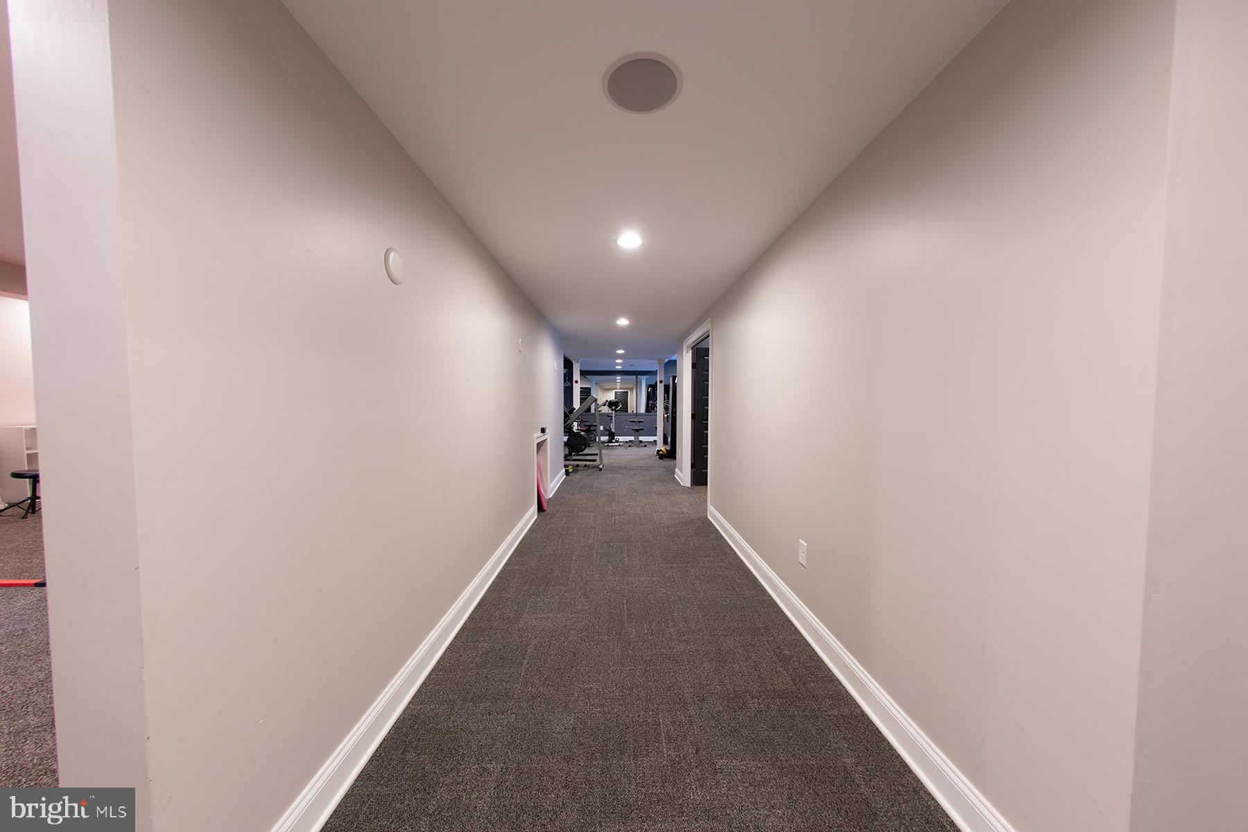 219 Old Magothy Bridge Road Pasadena, MD 21122 - Photo 72 of 85 Basement hallway to theater and gym