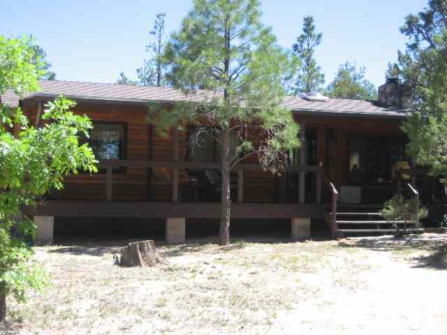 2039 Lone Mountain Road Overgaard, AZ 85933 - Photo 1 of 5 a view of a house