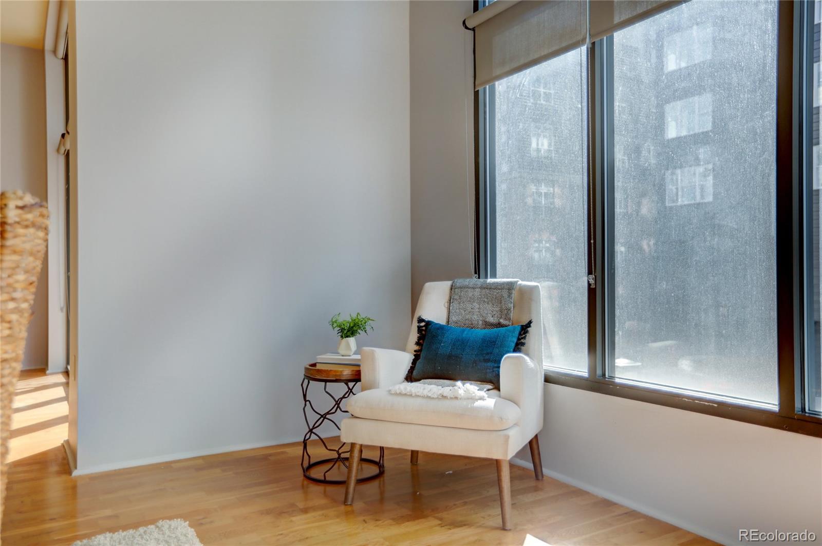 3100 Huron Street, Unit 2R Denver, CO 80202 - Photo 27 of 33 a view of a room with a table and chairs
