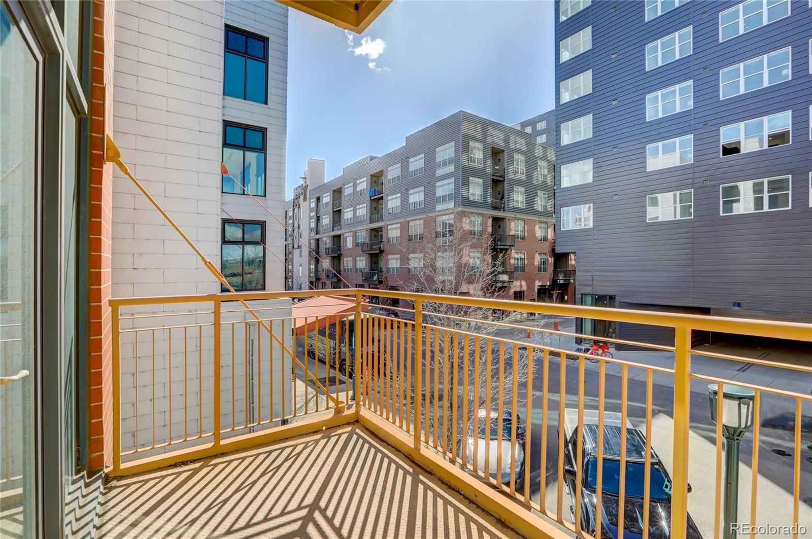 3100 Huron Street, Unit 2R Denver, CO 80202 - Photo 29 of 33 a view of a building from a balcony