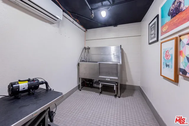 a room with a table and chairs