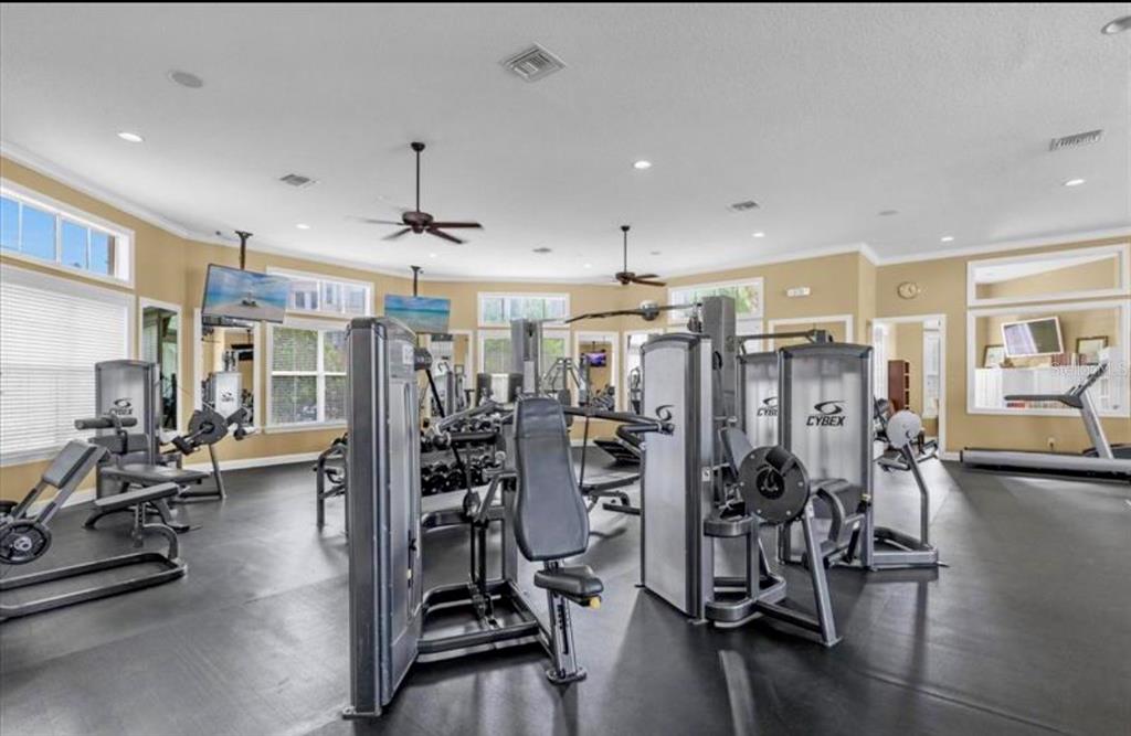 8253 Maritime Flag Street, Unit 109 Windermere, FL 34786 - Photo 22 of 23 a view of a room with gym equipment