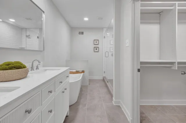 a bathroom with a sink and a shower