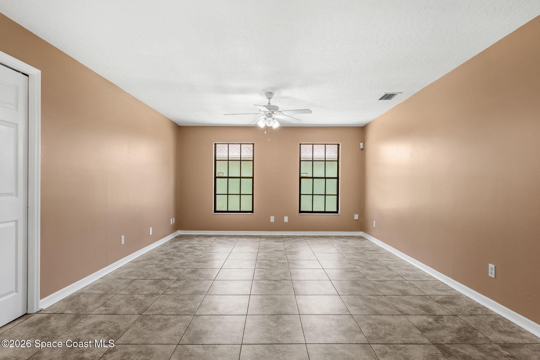 950 Whisperpine Drive Melbourne, FL 32901 - Photo 16 of 51 Living Room