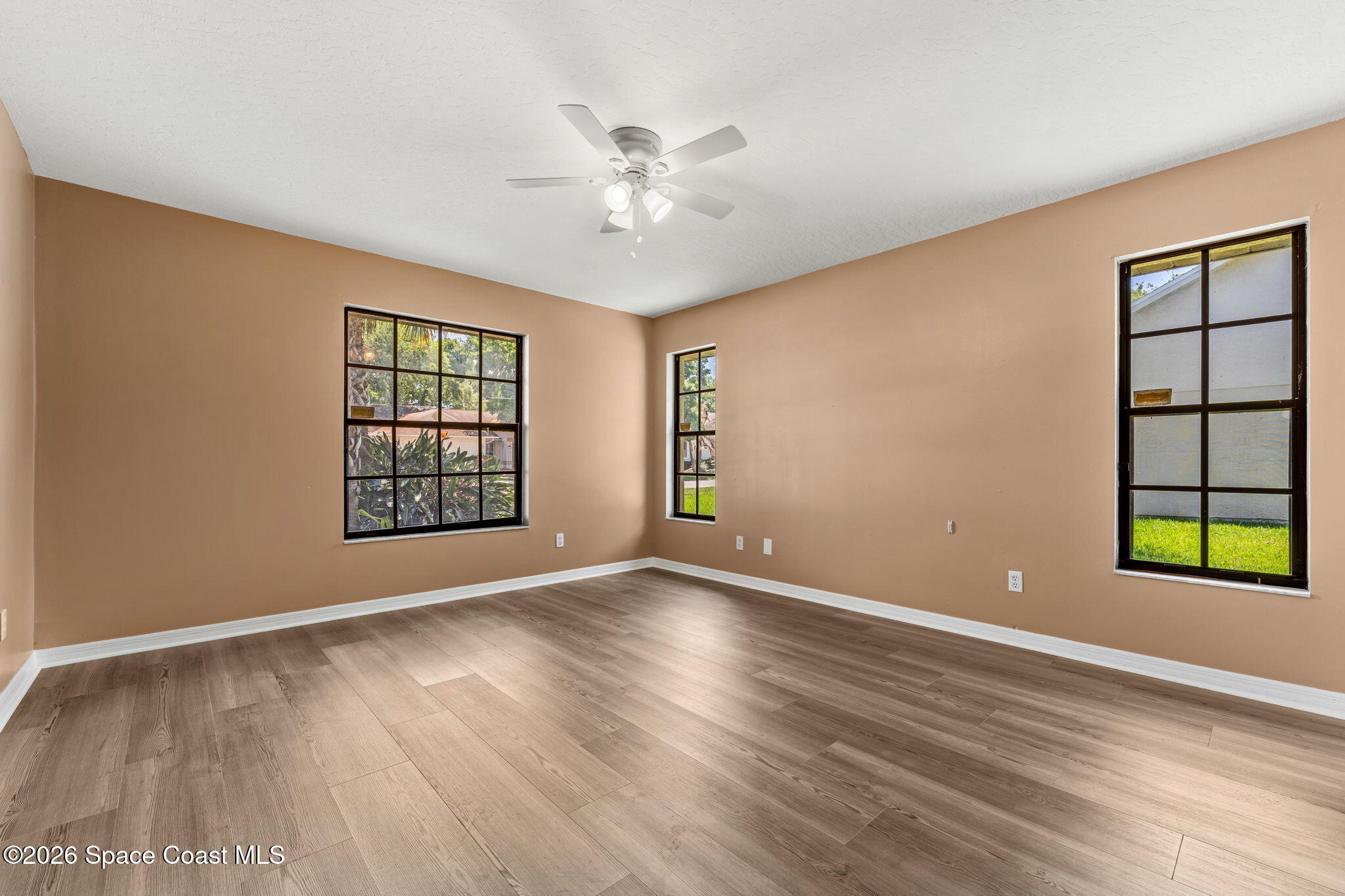 950 Whisperpine Drive Melbourne, FL 32901 - Photo 19 of 51 Primary Bedroom