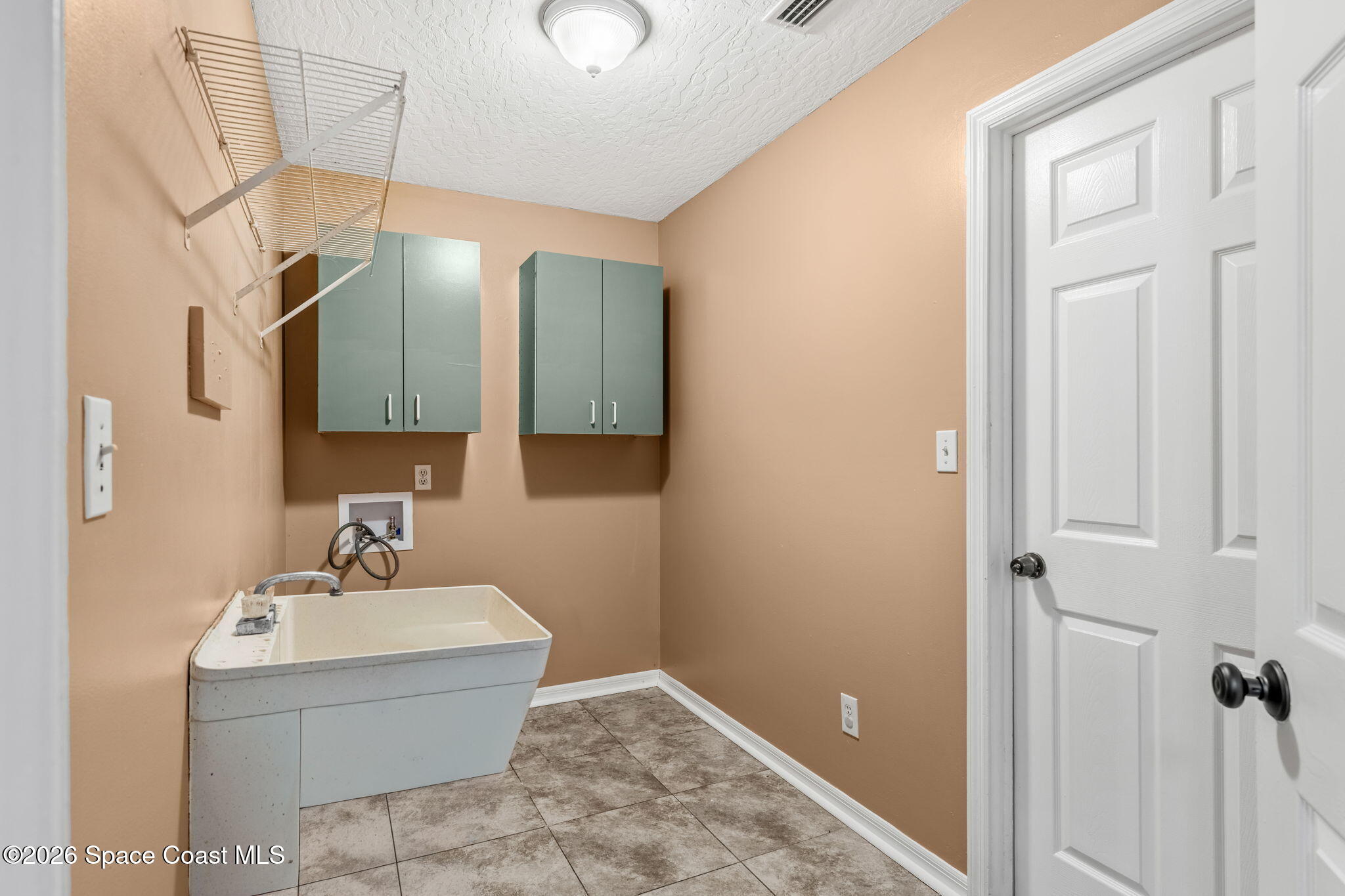 950 Whisperpine Drive Melbourne, FL 32901 - Photo 32 of 51 Interior Laundry