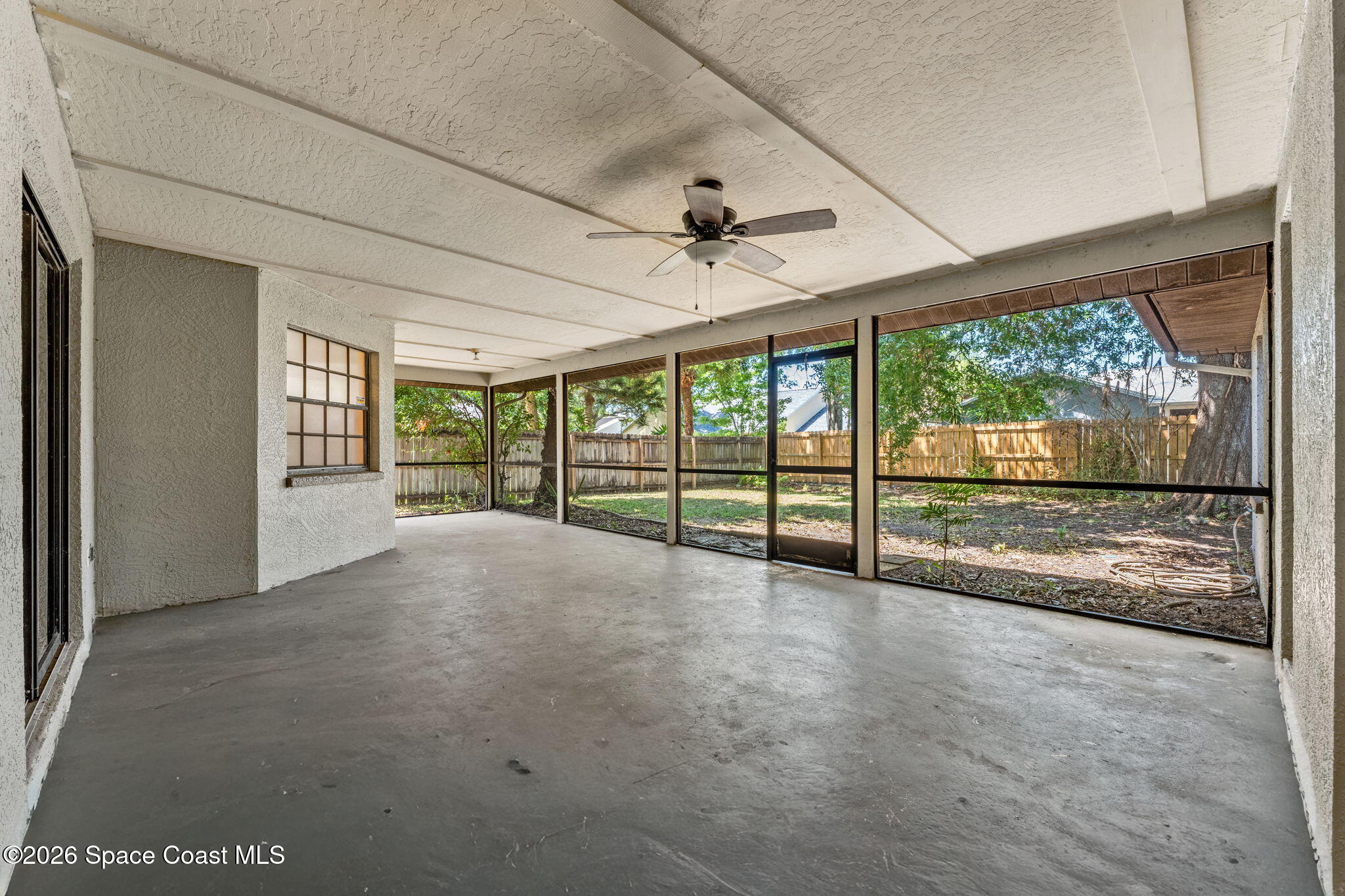 950 Whisperpine Drive Melbourne, FL 32901 - Photo 34 of 51 Screened porch