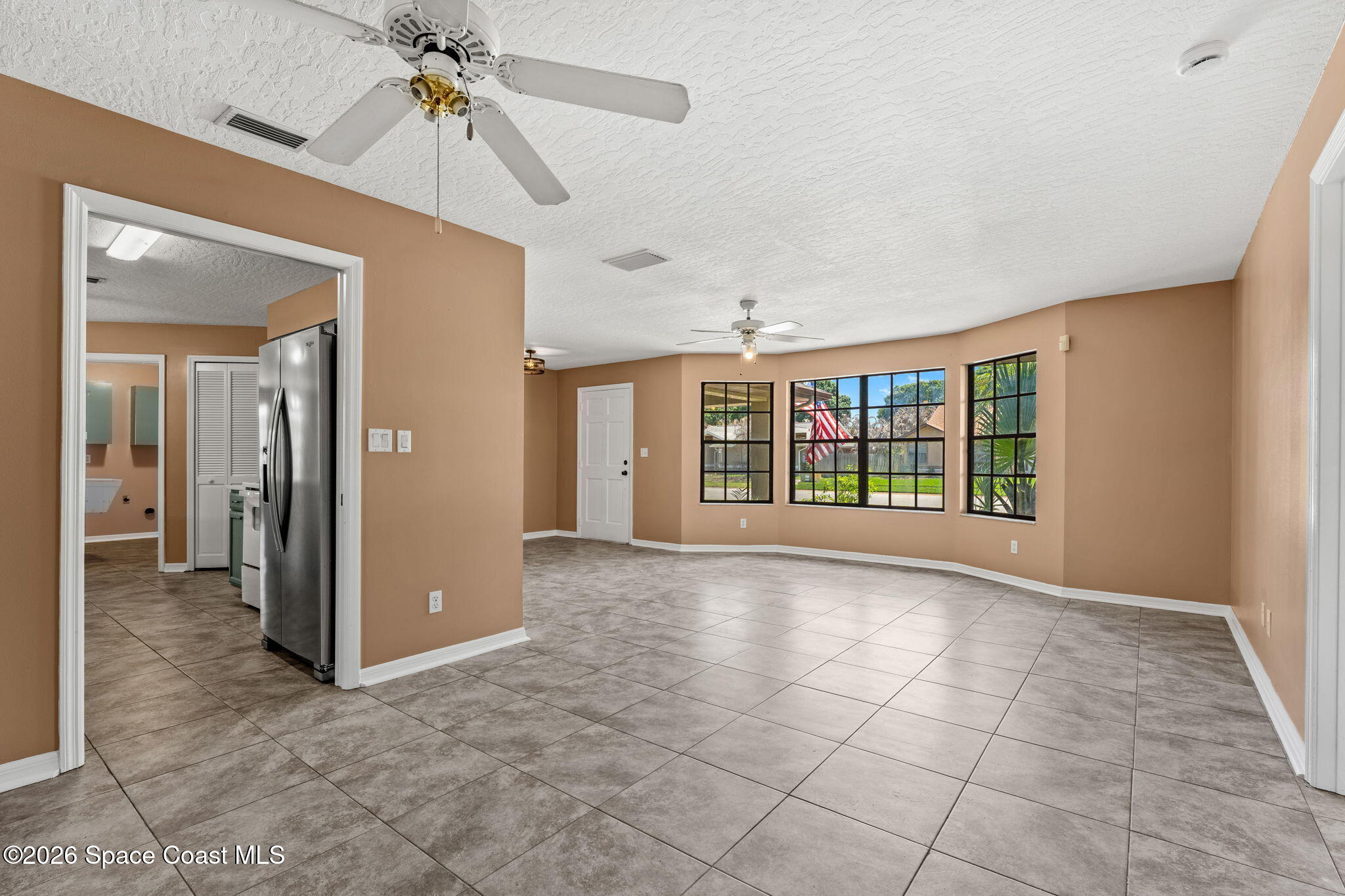 950 Whisperpine Drive Melbourne, FL 32901 - Photo 5 of 51 Living Room/Dining Room