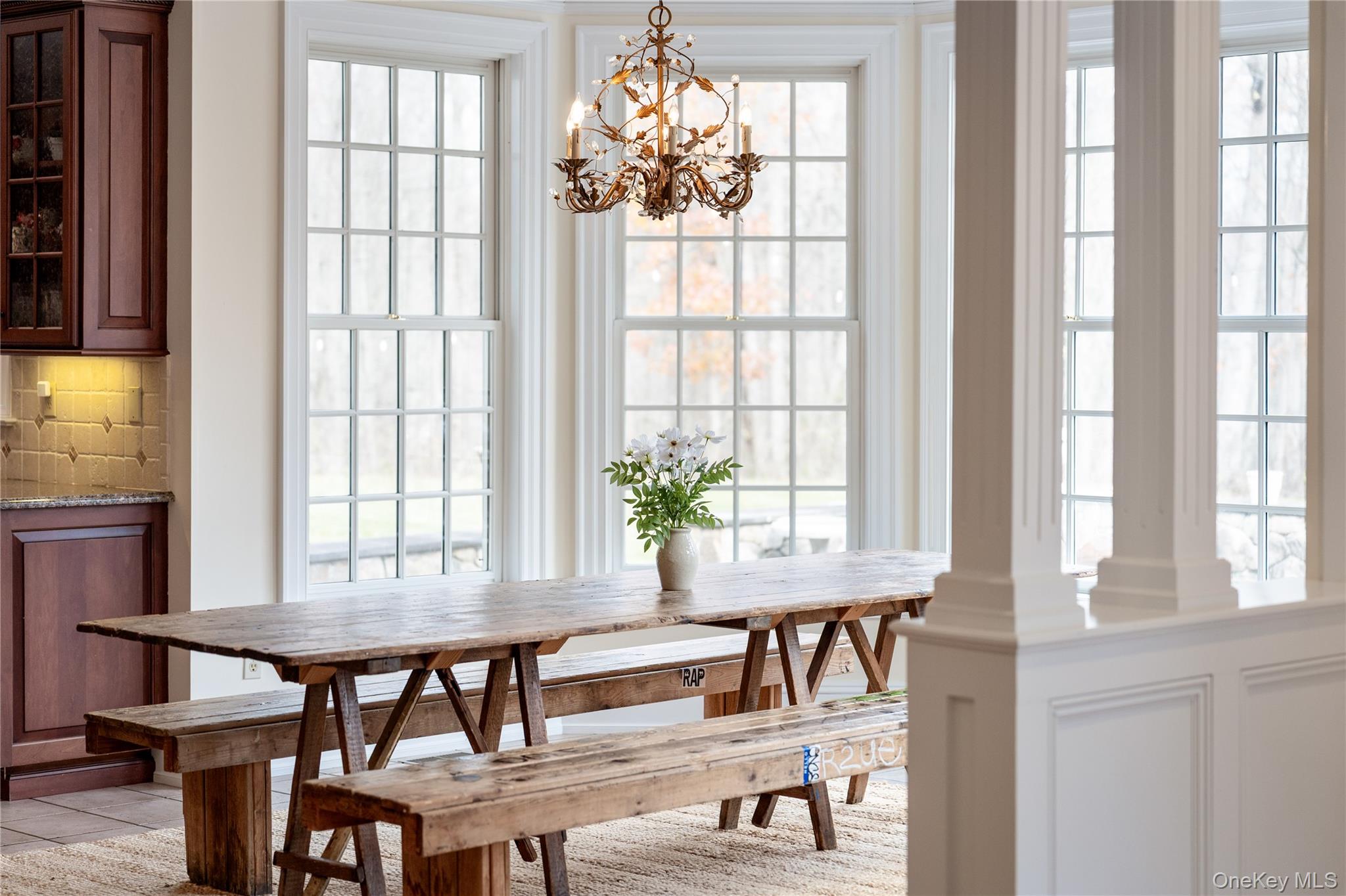 11 Lost Nations Road Pound Ridge, NY 10576 - Photo 16 of 42 a dining room with furniture and window