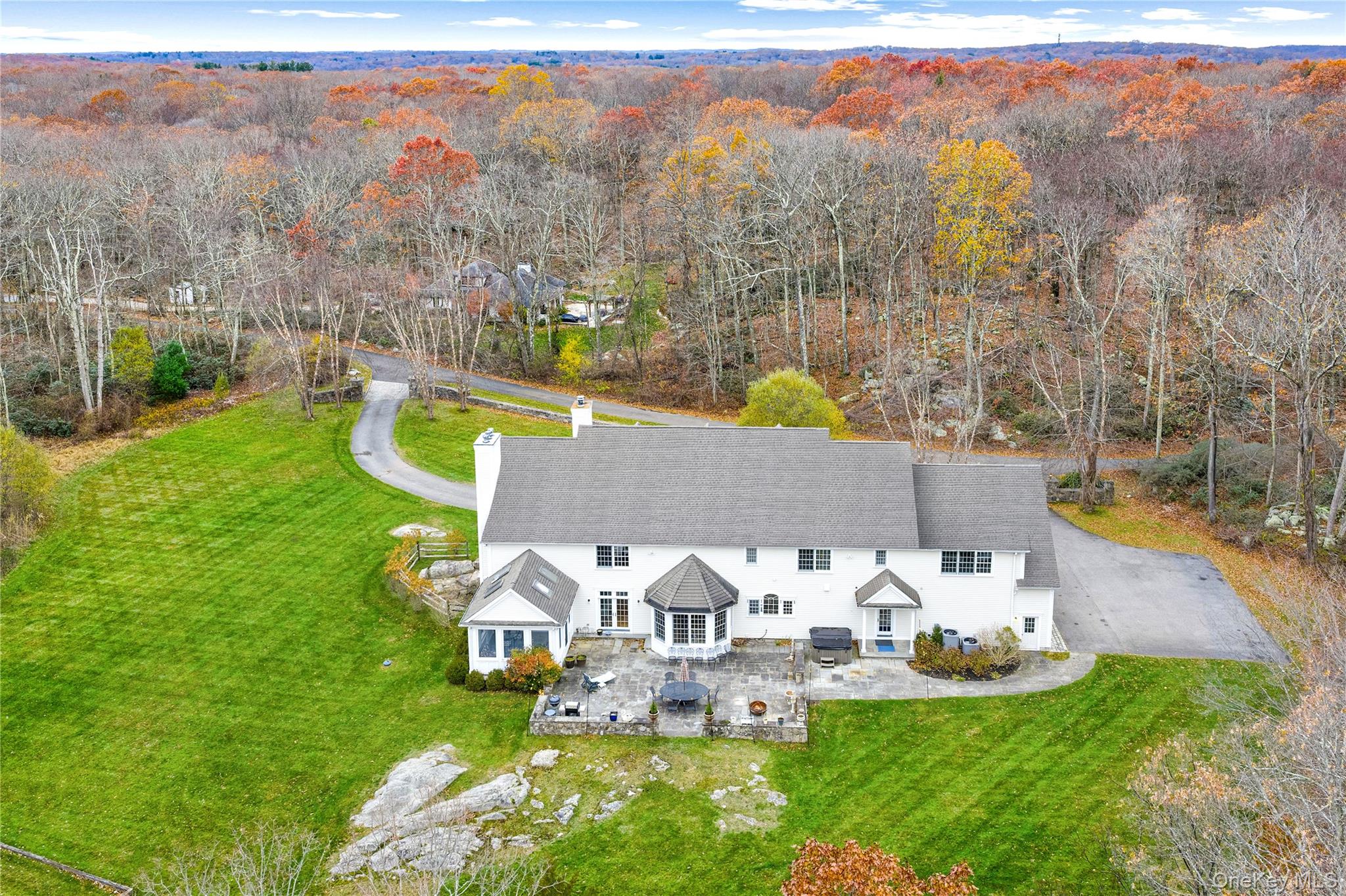 11 Lost Nations Road Pound Ridge, NY 10576 - Photo 21 of 42 a view of a house with a yard