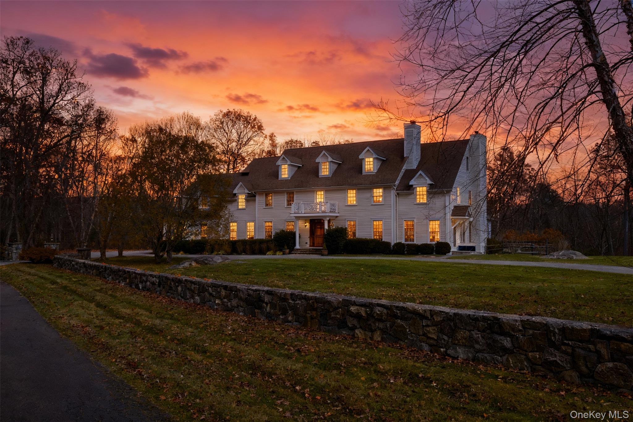11 Lost Nations Road Pound Ridge, NY 10576 - Photo 41 of 42 a view of a house with a yard