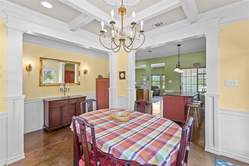 325 Bolton Road Granbury, TX 76049 - Photo 20 of 39 Coffered ceiling with recessed lighting and chandelier