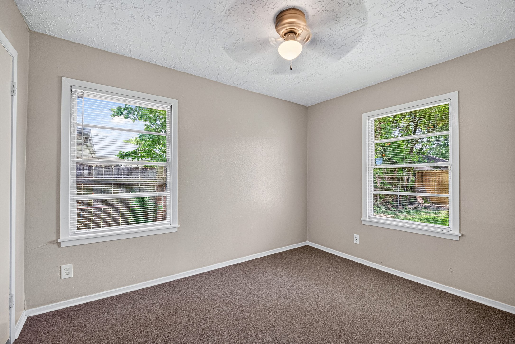 3218 Grant Street Pasadena, TX 77503 - Photo 17 of 26 The third bedroom with the same neutral color and new carpet.