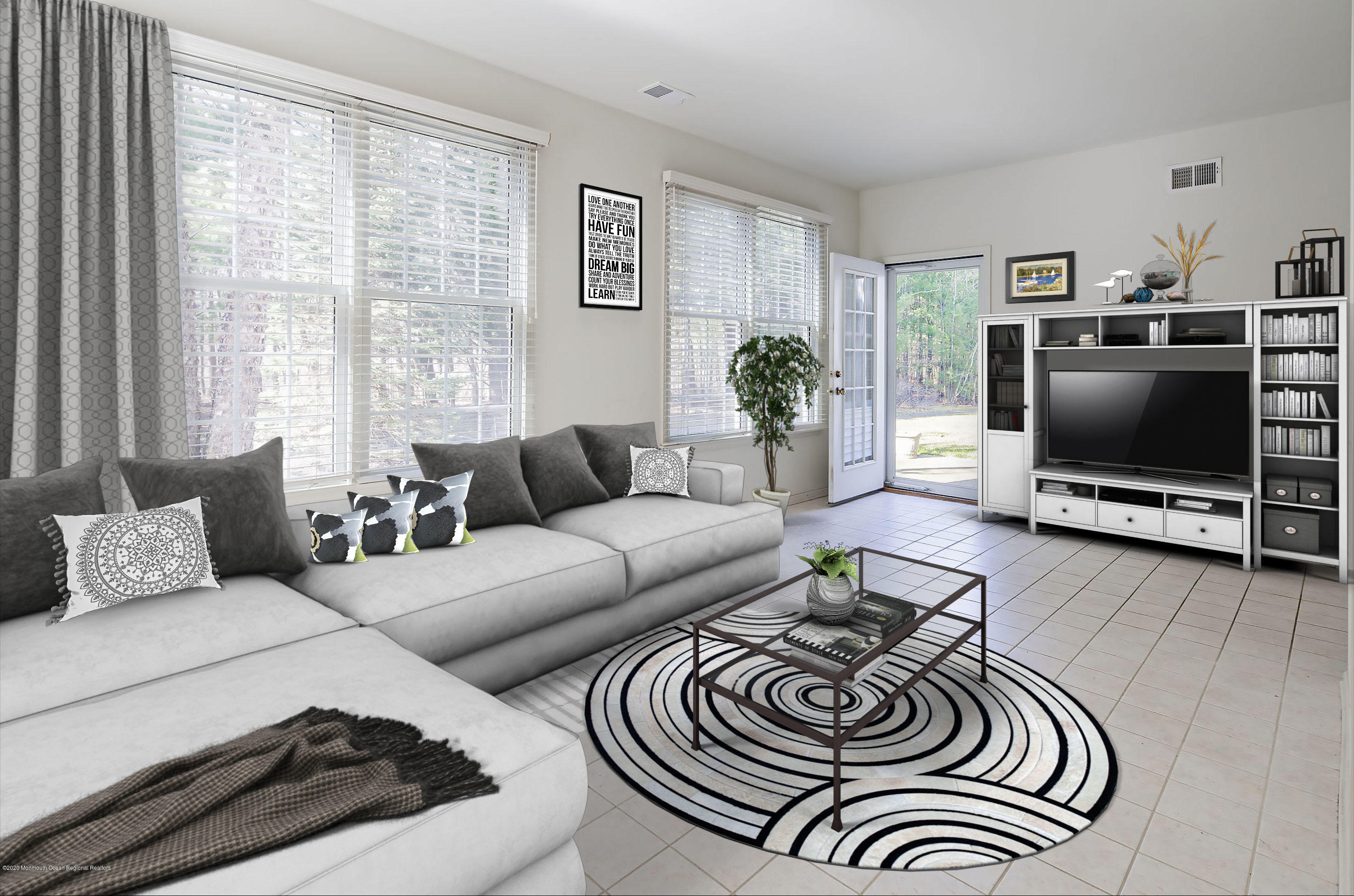 7 Elsworth Place Holmdel, NJ 07733 - Photo 11 of 23 a living room with furniture and a flat screen tv
