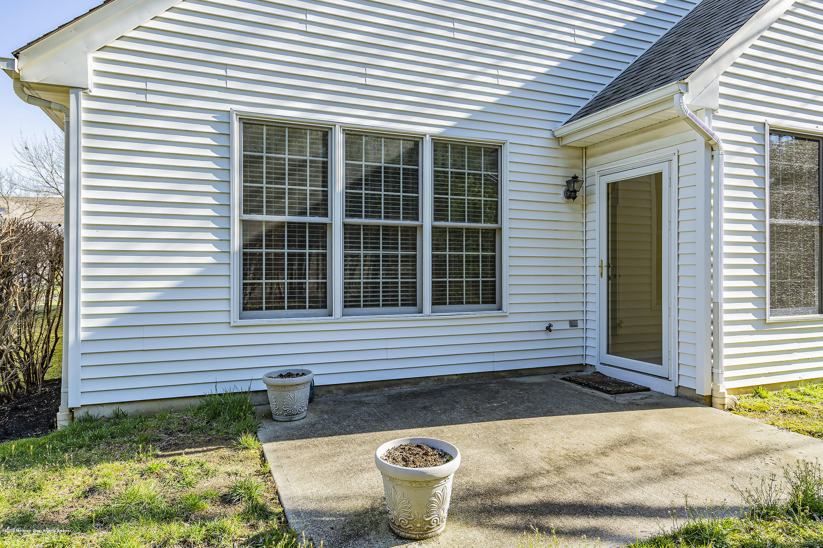 7 Elsworth Place Holmdel, NJ 07733 - Photo 13 of 23 a front view of a house with porch