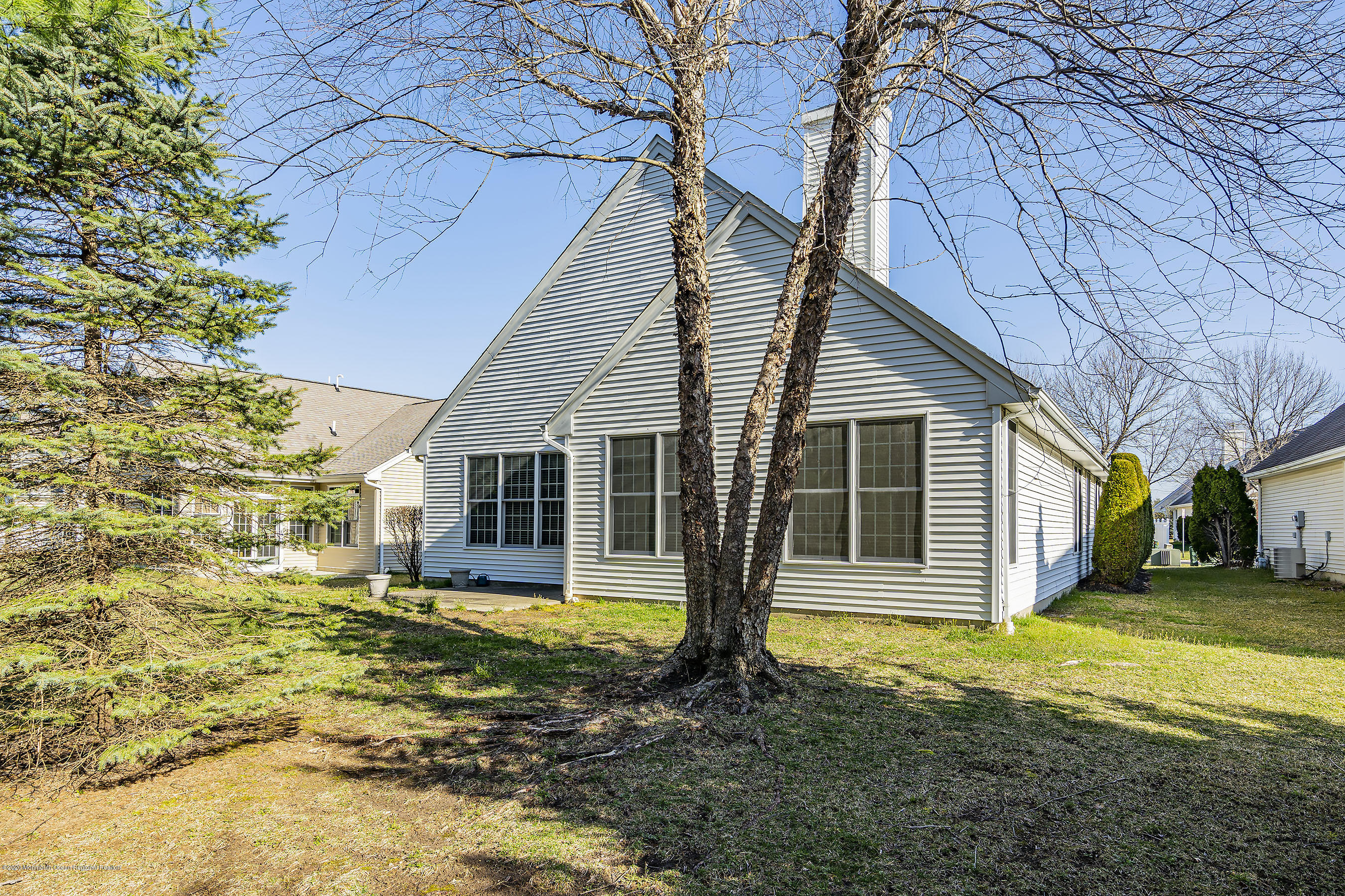 7 Elsworth Place Holmdel, NJ 07733 - Photo 15 of 23 a view of a house with backyard and a tree