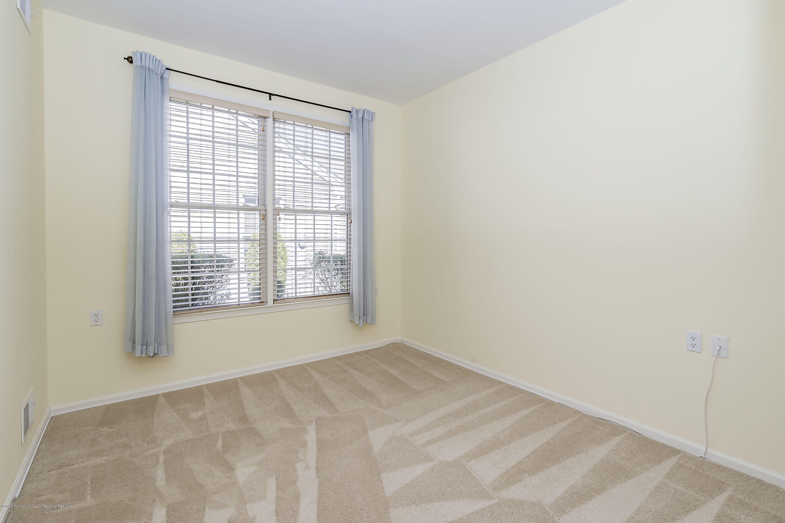 7 Elsworth Place Holmdel, NJ 07733 - Photo 16 of 23 a view of an empty room with a window