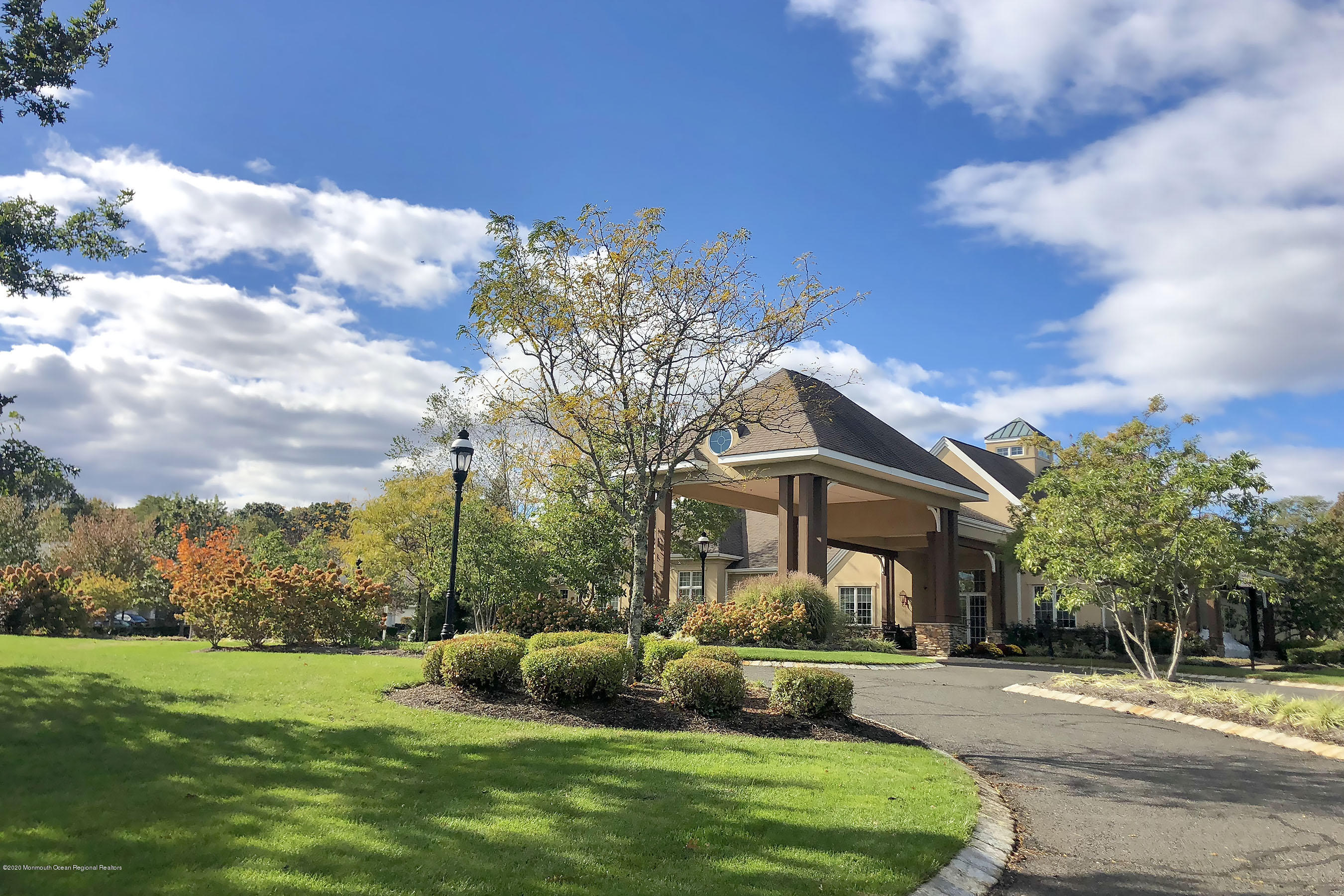 7 Elsworth Place Holmdel, NJ 07733 - Photo 23 of 23 a front view of a house with garden