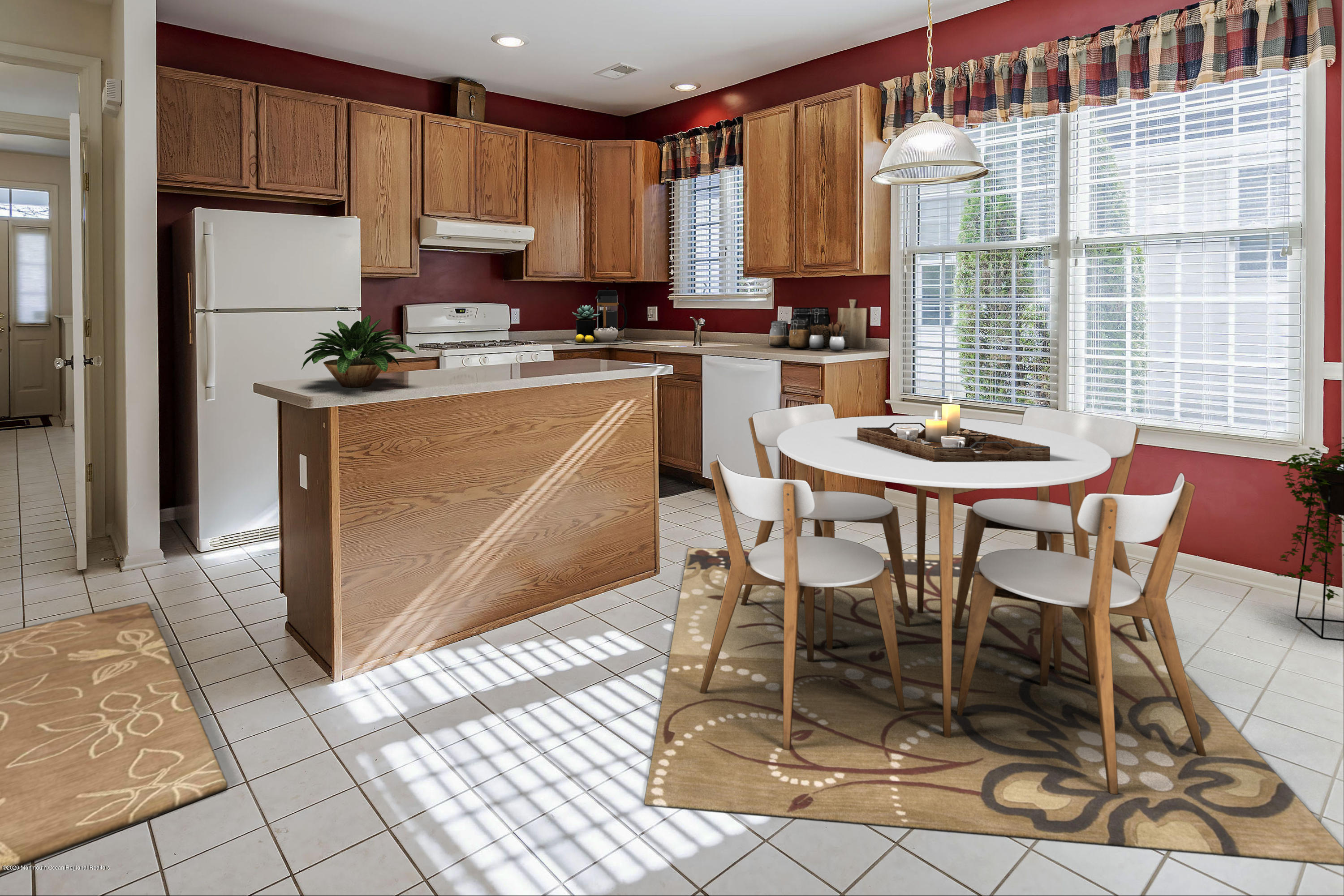 7 Elsworth Place Holmdel, NJ 07733 - Photo 5 of 23 a kitchen with stainless steel appliances a dining table chairs and granite counter tops