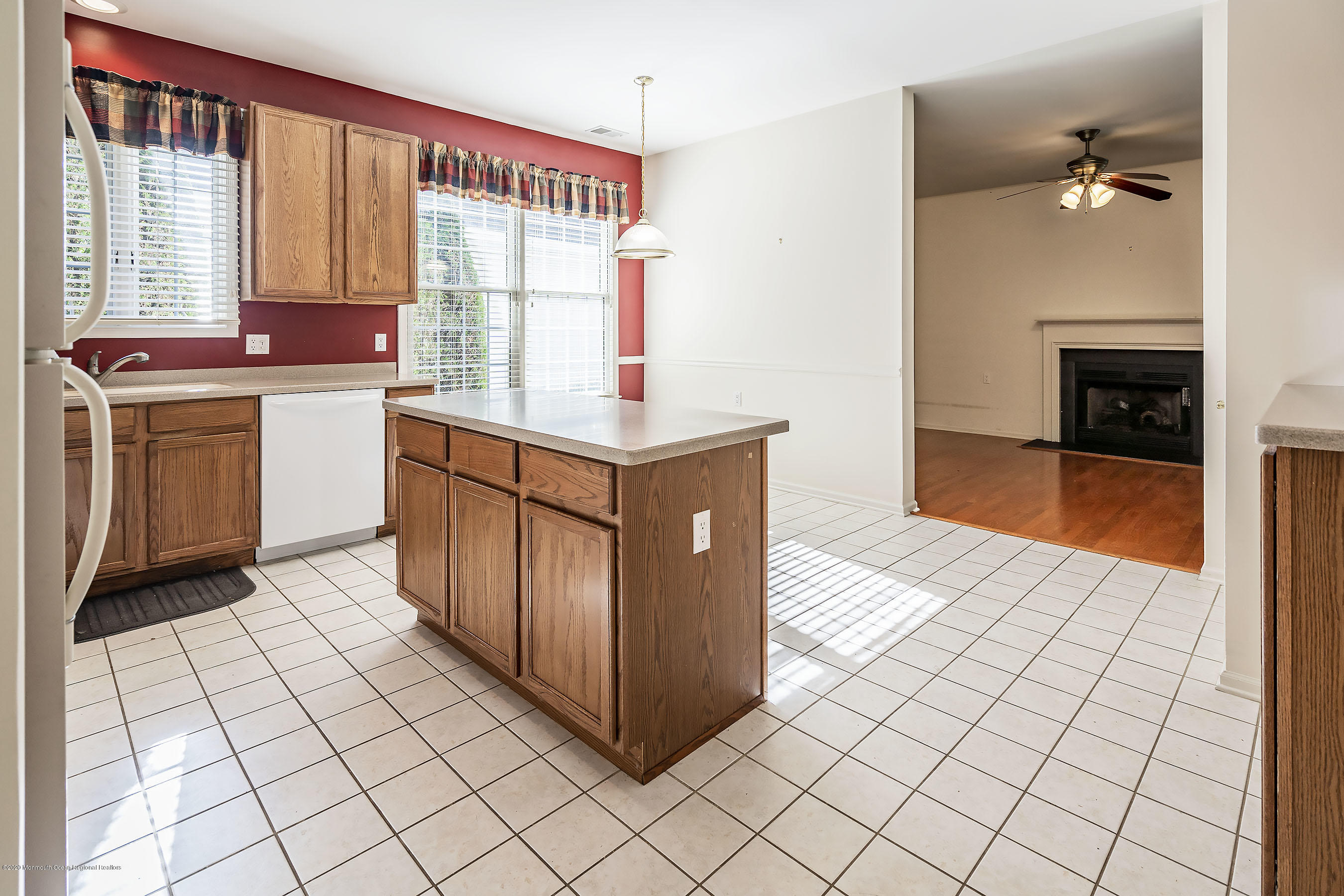 7 Elsworth Place Holmdel, NJ 07733 - Photo 9 of 23 a kitchen with stainless steel appliances a sink and cabinets