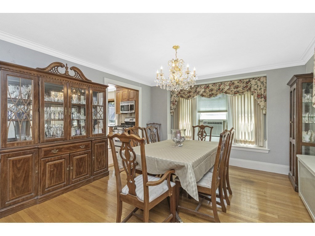 230 Clark Road Brookline, MA 02445 - Photo 4 of 27 a view of a dining room with furniture and window