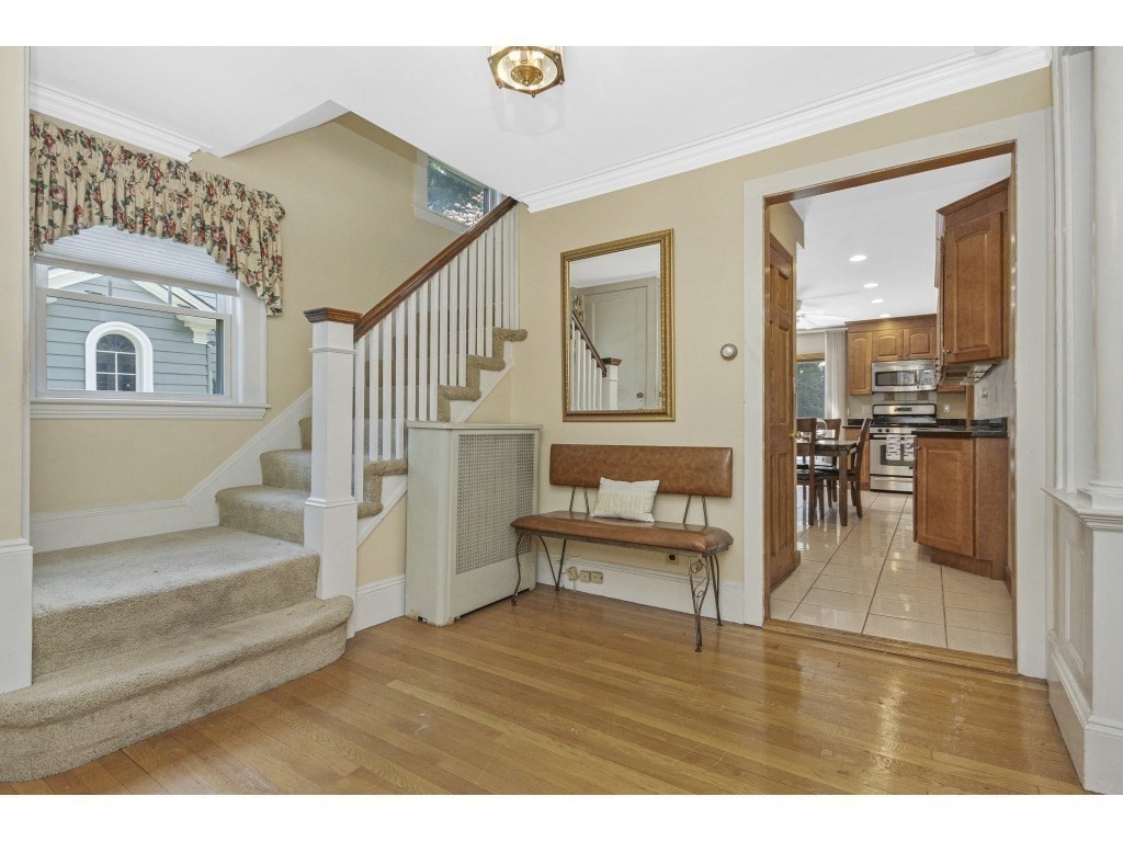 230 Clark Road Brookline, MA 02445 - Photo 10 of 27 a view of livingroom with furniture and wooden floor