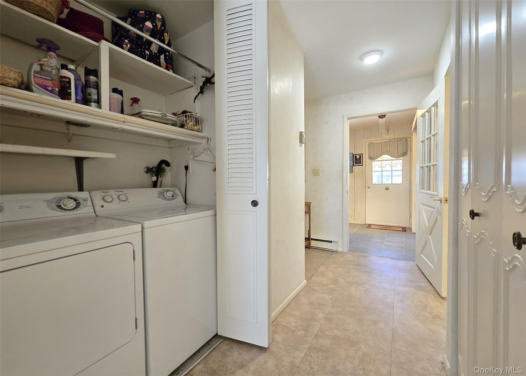 289 Cardiff Court, Unit B Ridge, NY 11961 - Photo 12 of 20 a view of a hallway with closet