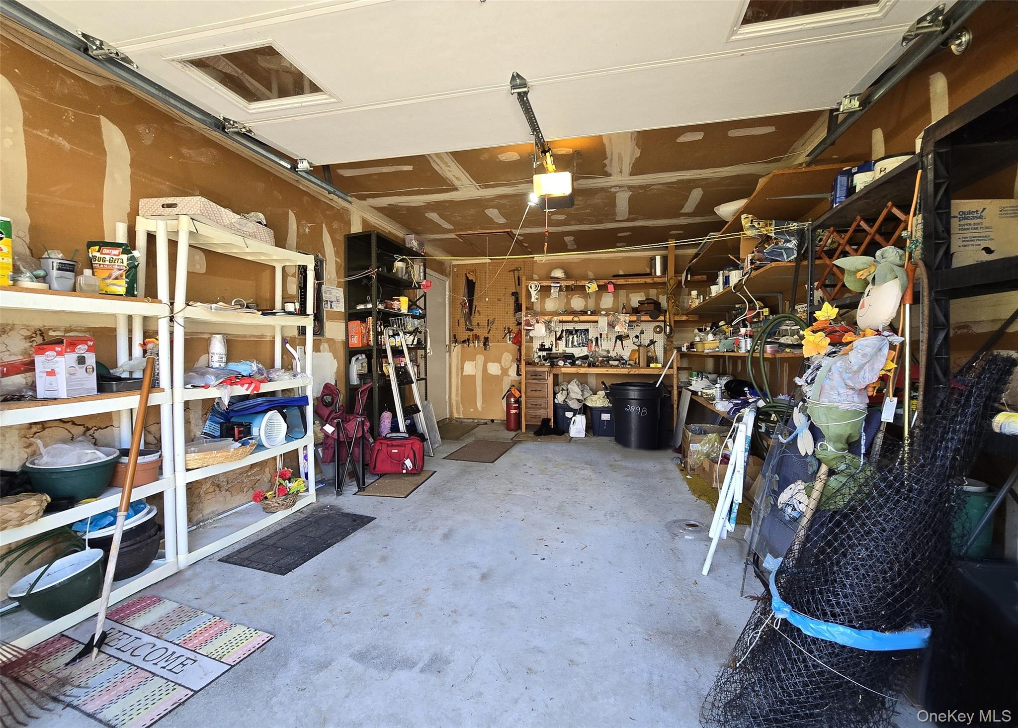 289 Cardiff Court, Unit B Ridge, NY 11961 - Photo 19 of 20 a view of storage and utility room