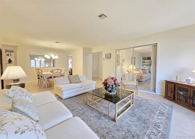 a kitchen with stainless steel appliances a refrigerator sink and microwave