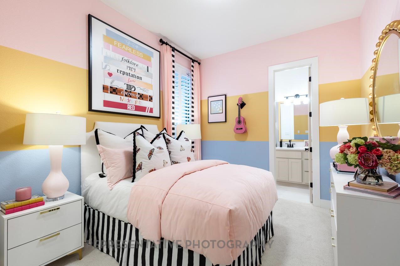 207 Wooded Rill Court Willis, TX 77318 - Photo 14 of 28 a bedroom with bed and a window